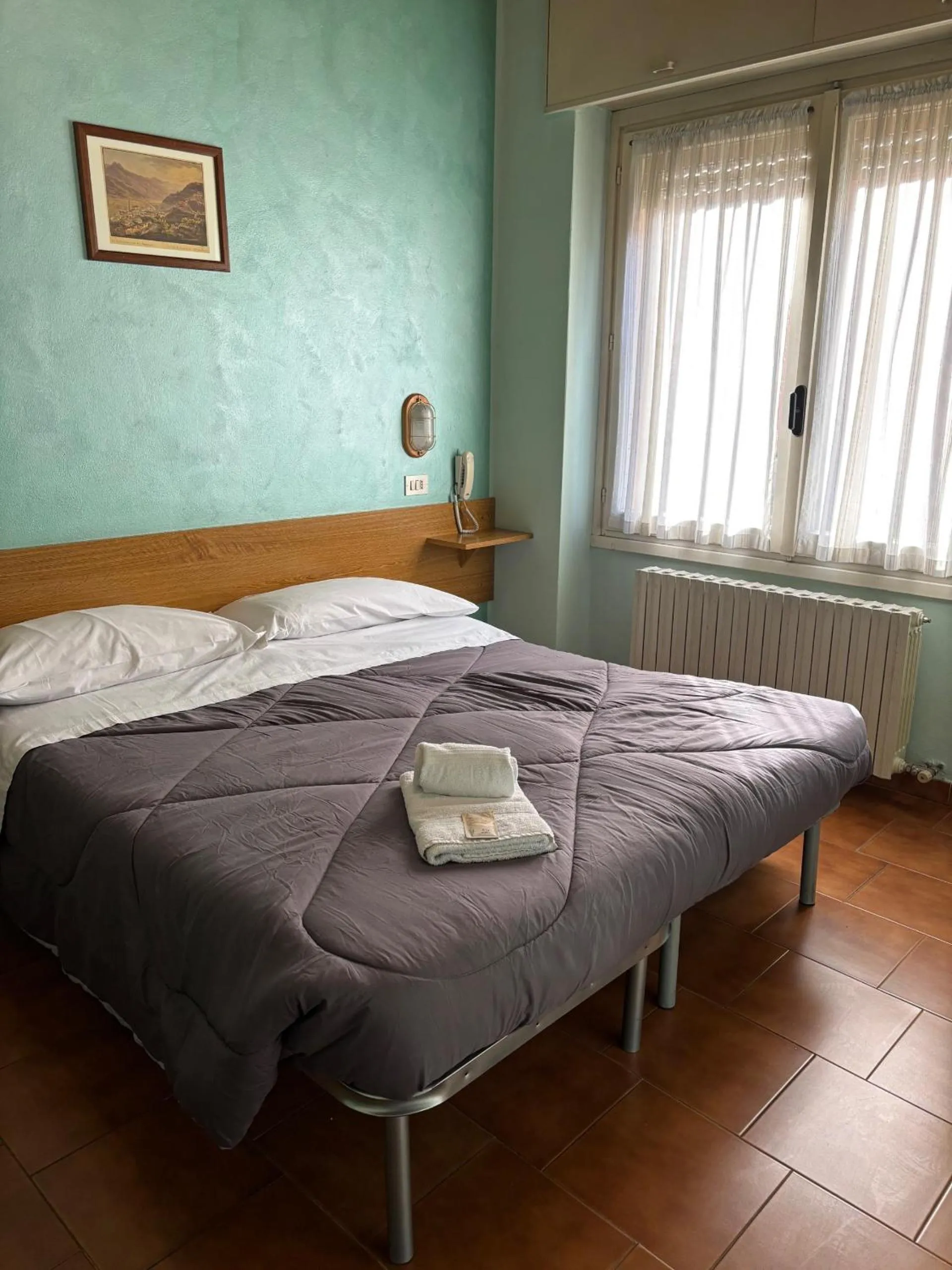 Bed in Albergo Baffo