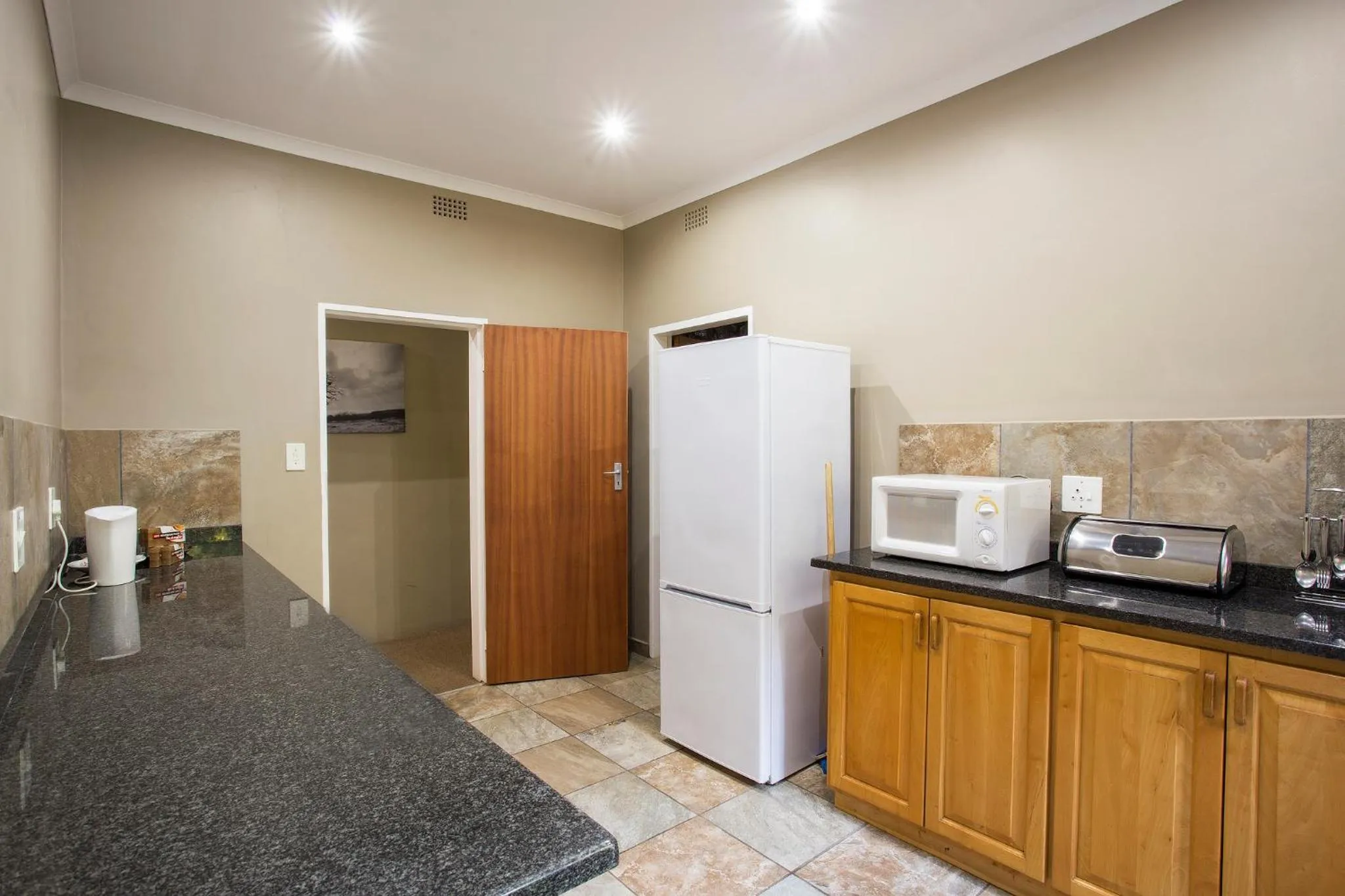 Kitchen or kitchenette in Merry Pebbles Resort