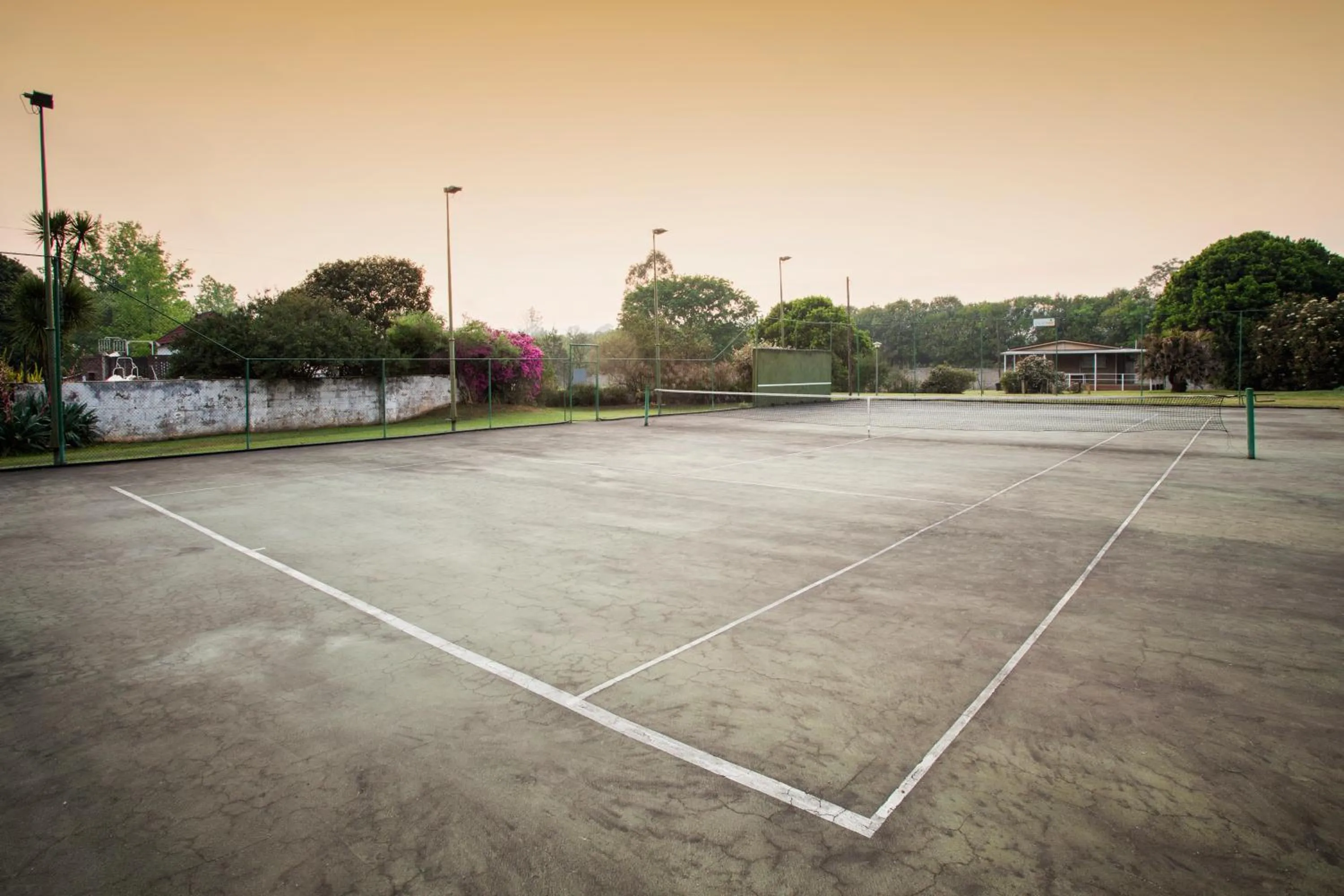 Tennis court in Merry Pebbles Resort