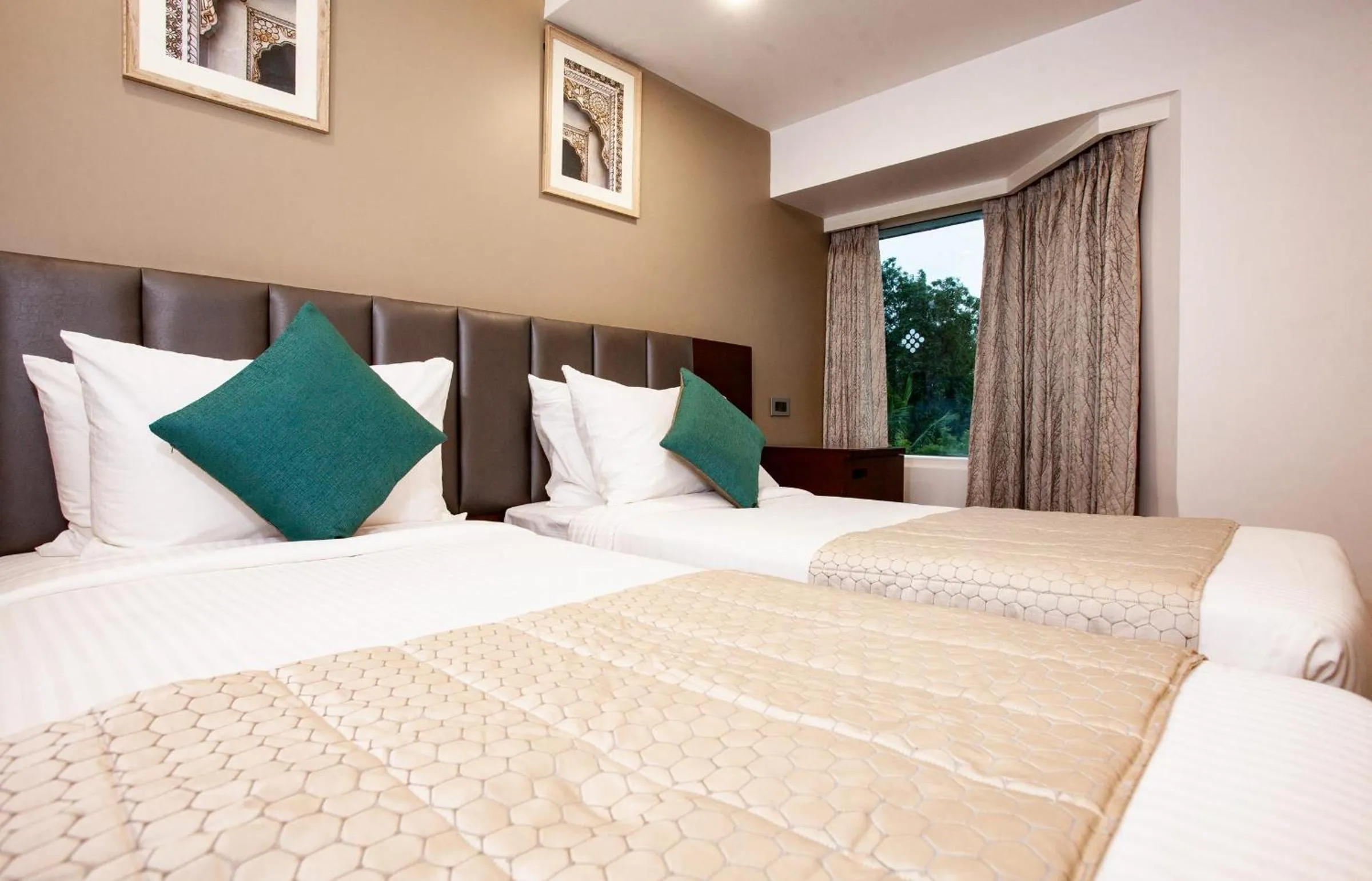 Bed in Mango Suites Viera