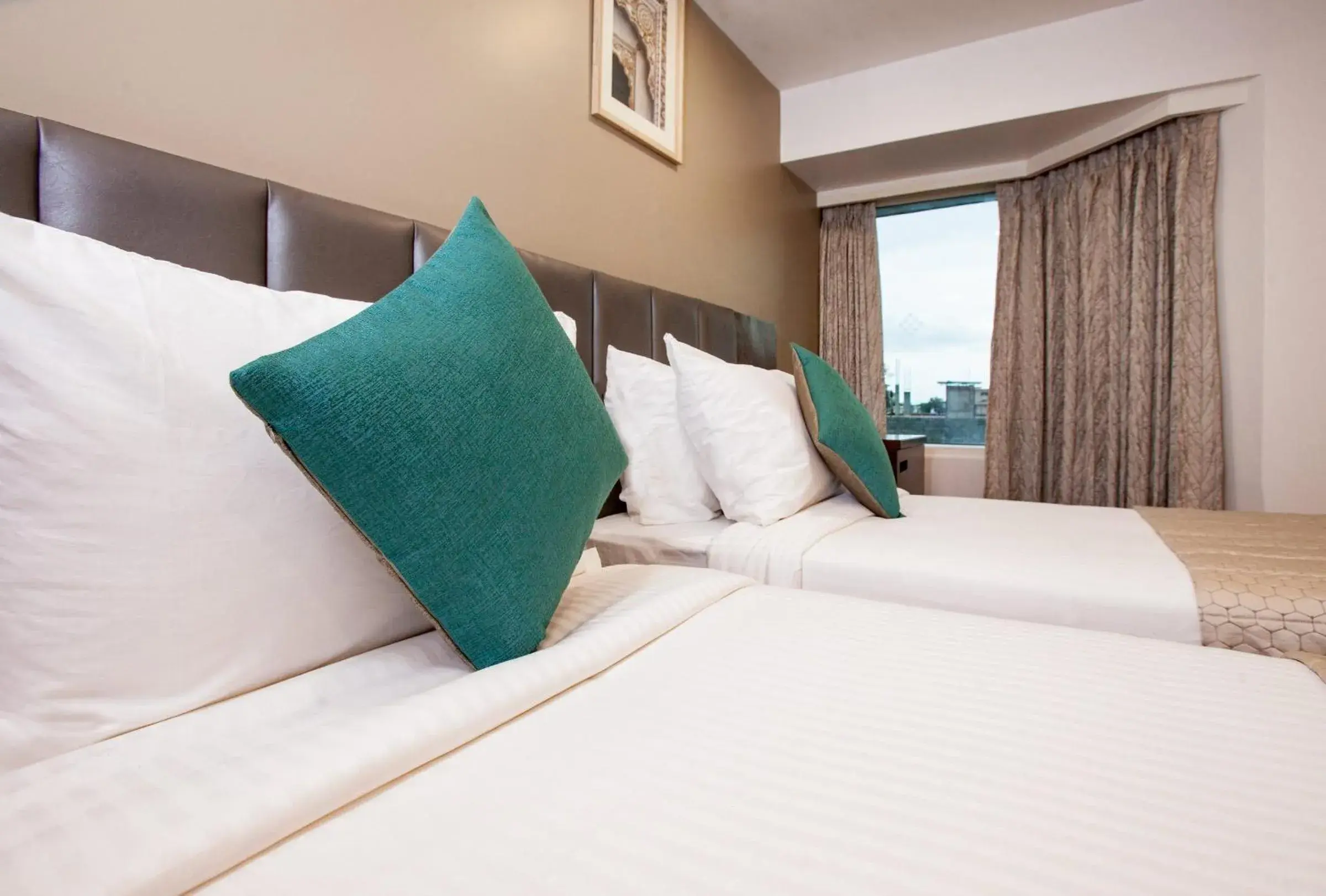 Bed in Mango Suites Viera Bed in Mango Suites Viera