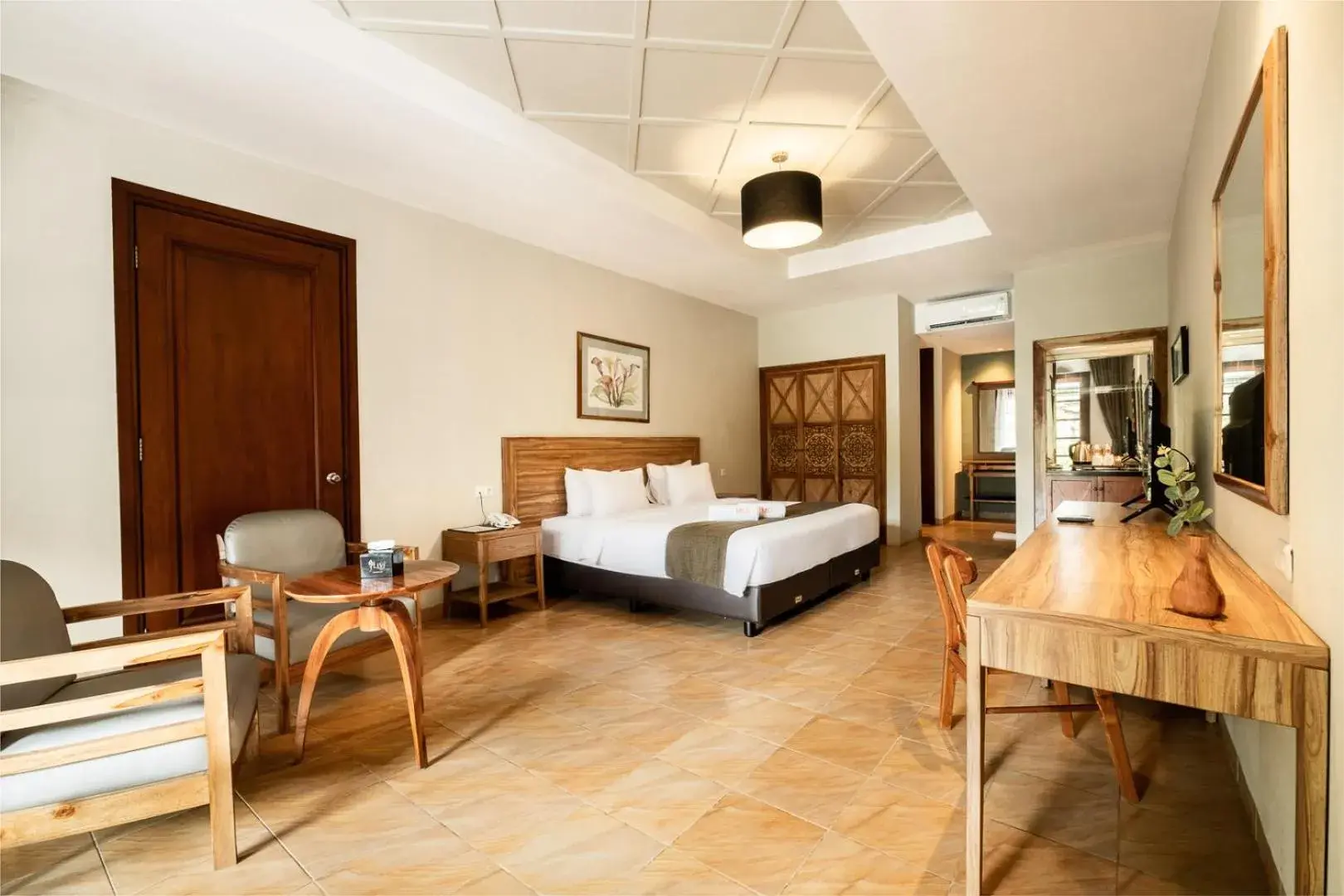 Bed in Mutiara Carita Cottages Bed in Mutiara Carita Cottages