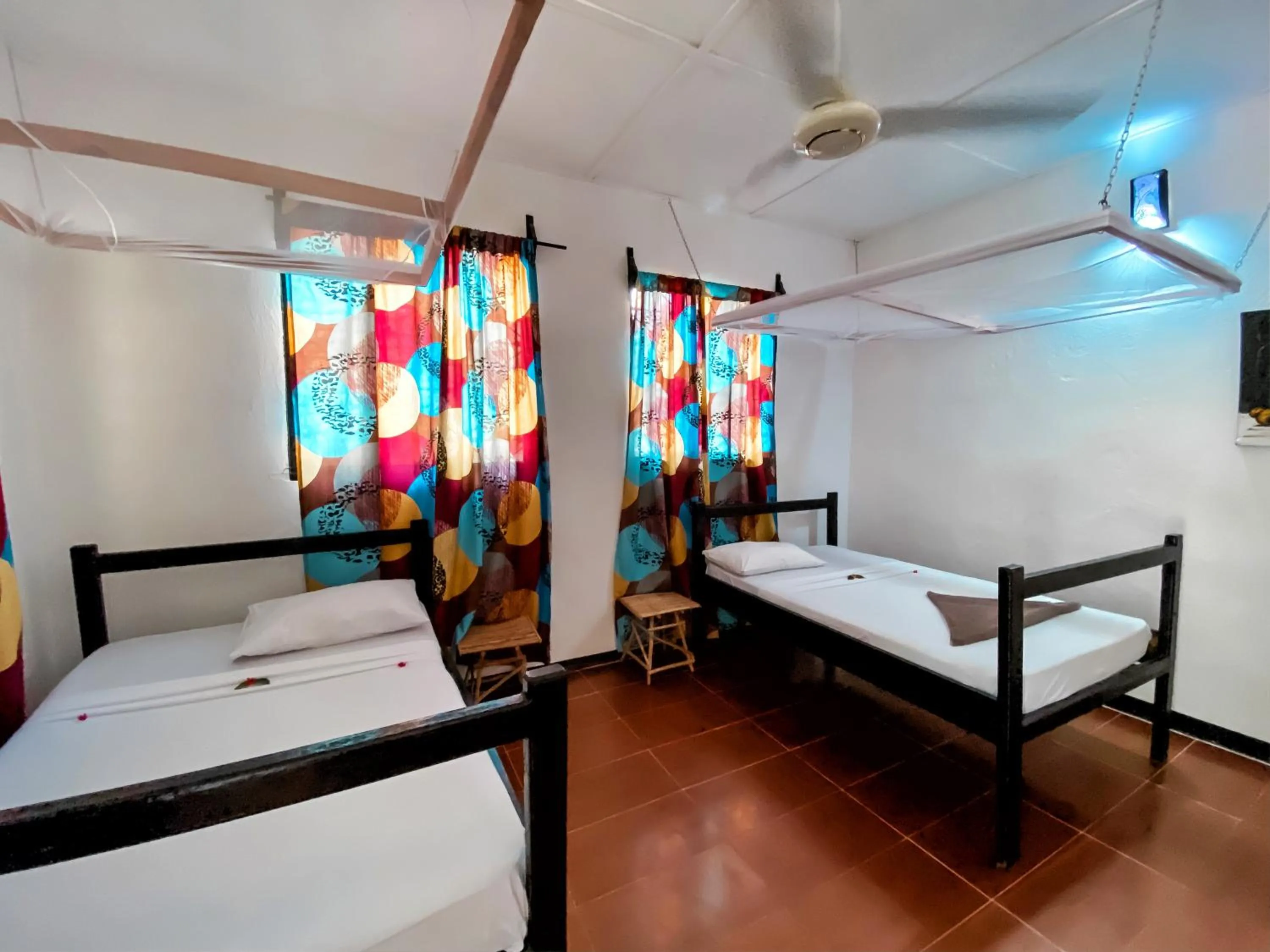 Bed in Papaya Guest House Nungwi