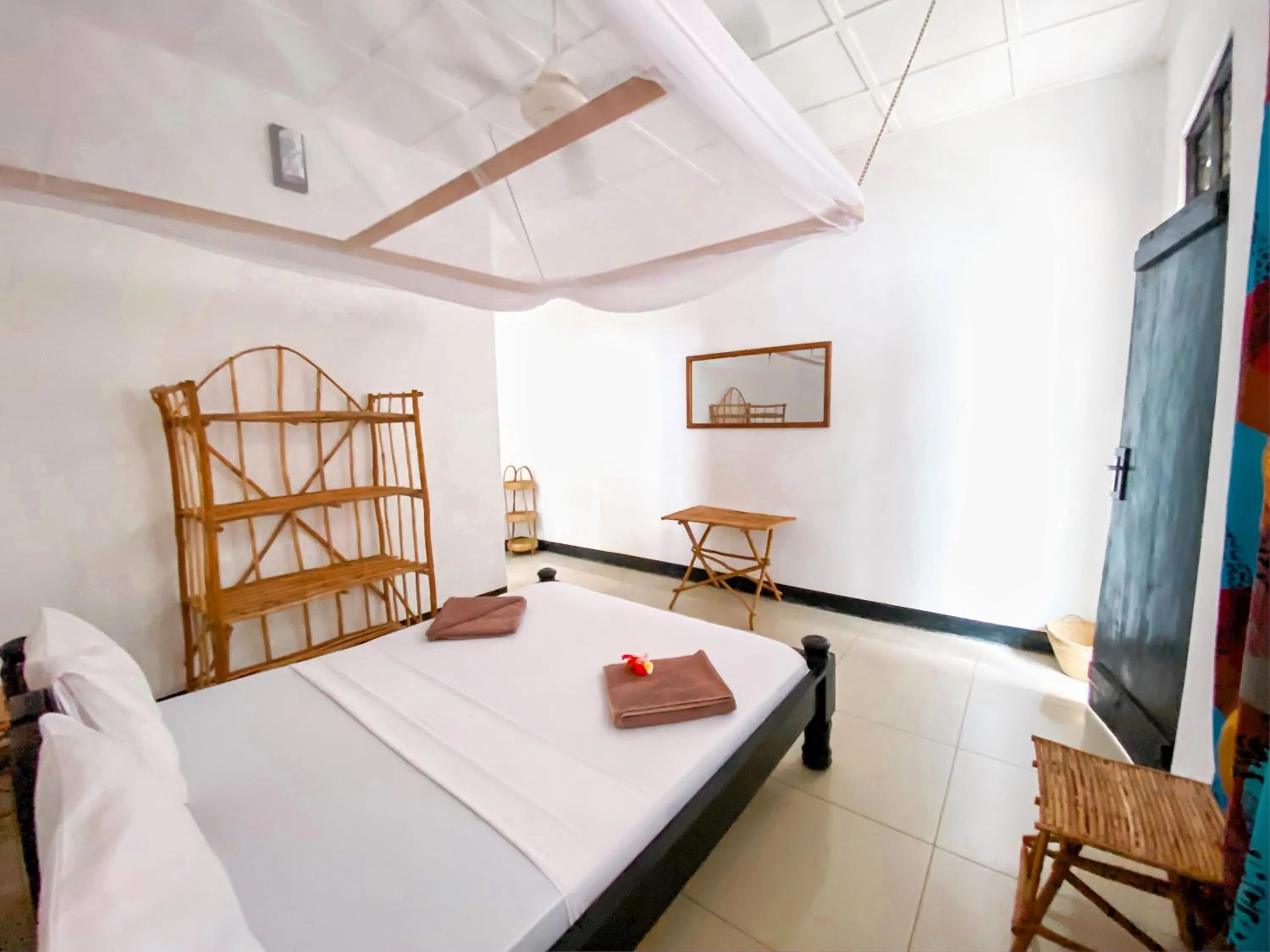 Bed in Papaya Guest House Nungwi