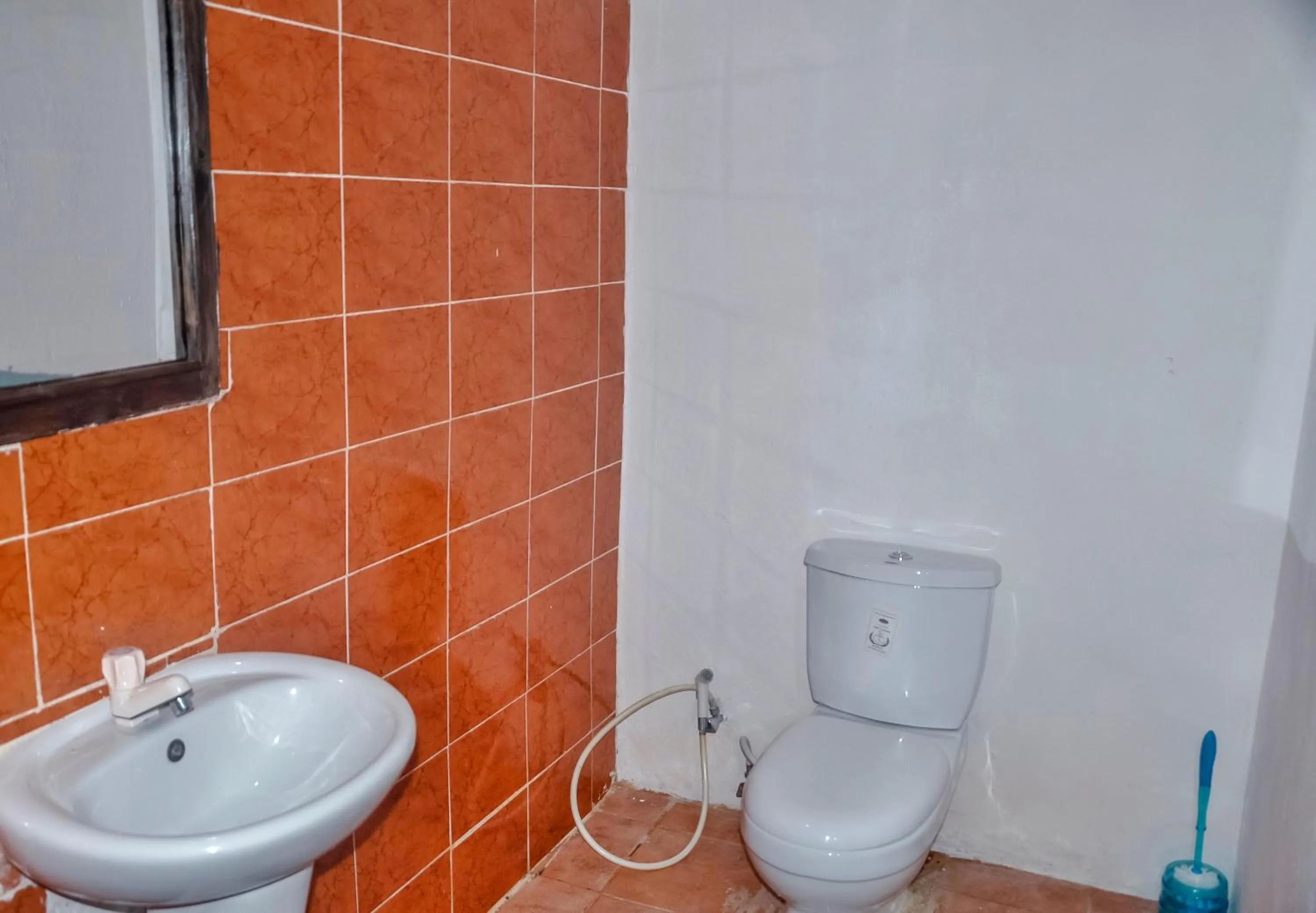 Toilet in Papaya Guest House Nungwi