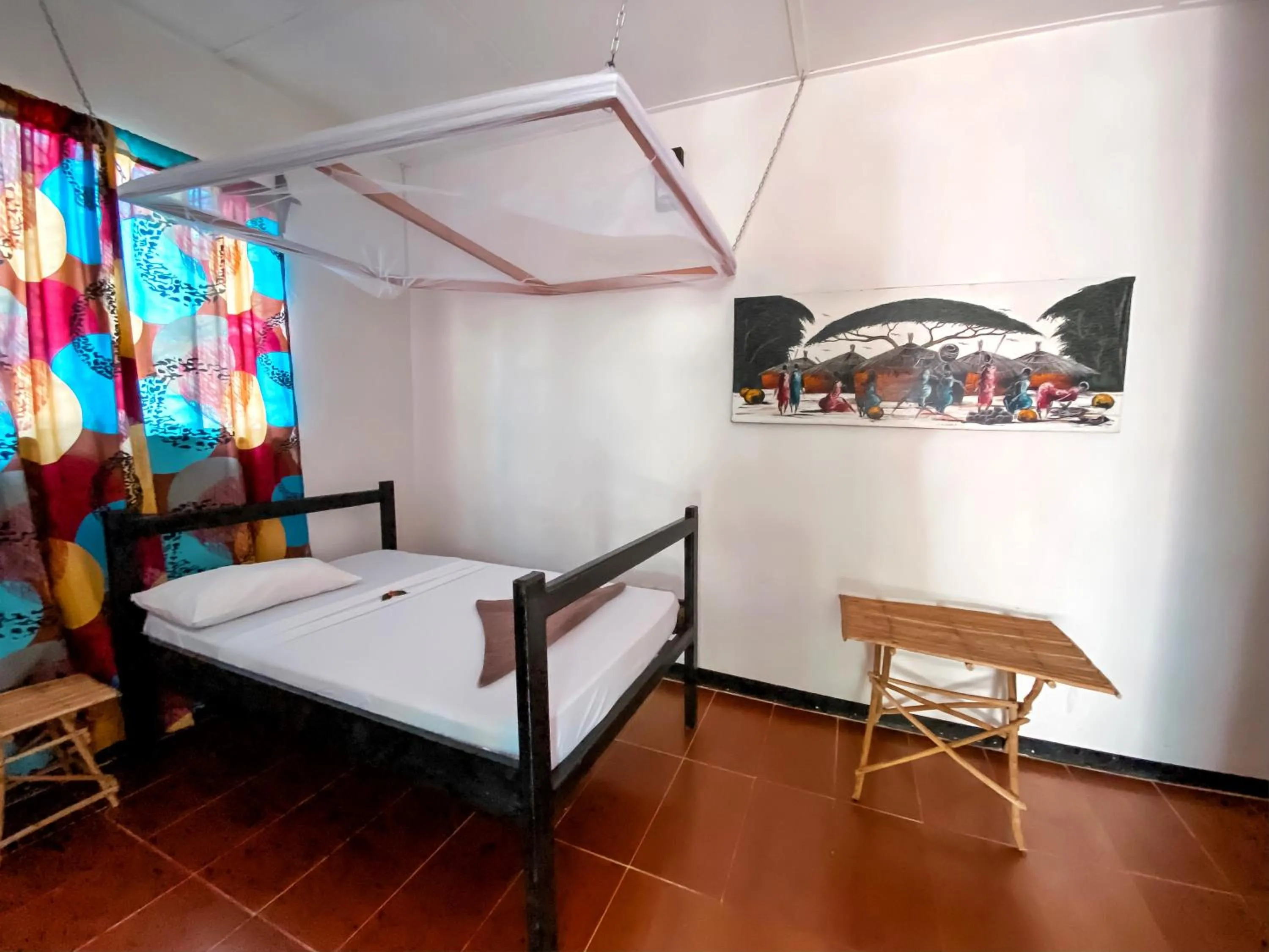 Bed in Papaya Guest House Nungwi