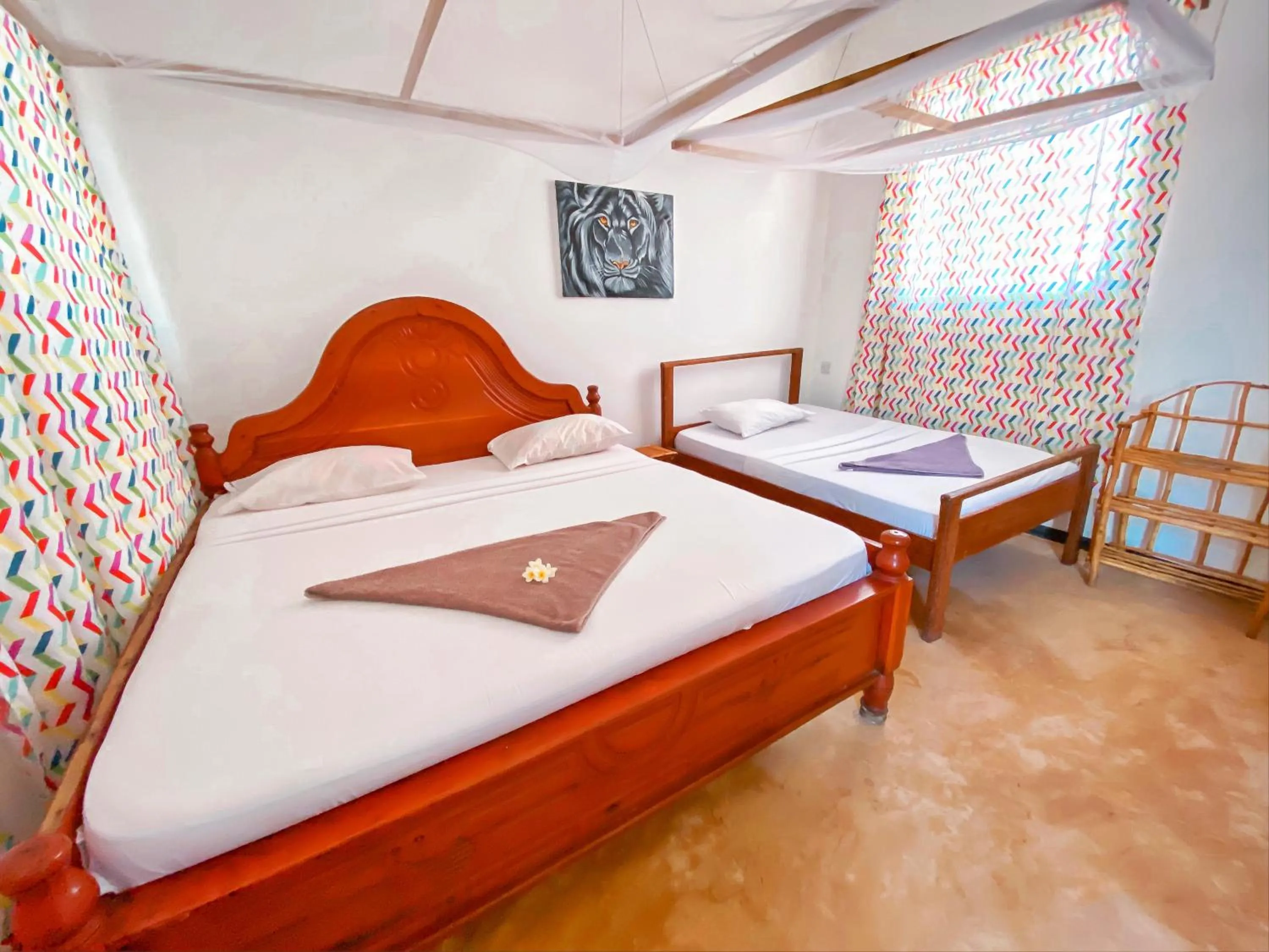 Bed in Papaya Guest House Nungwi