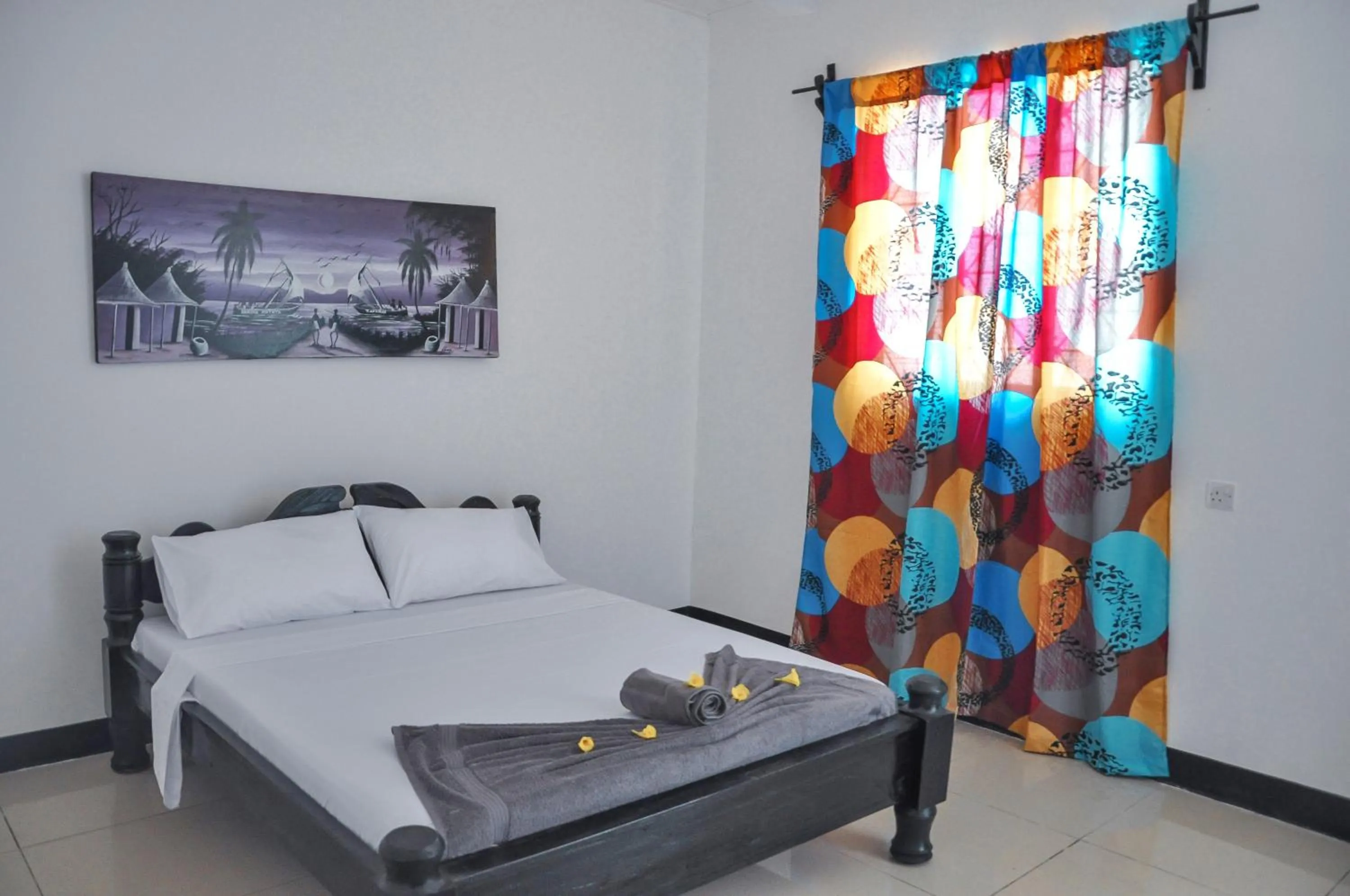 Bed in Papaya Guest House Nungwi