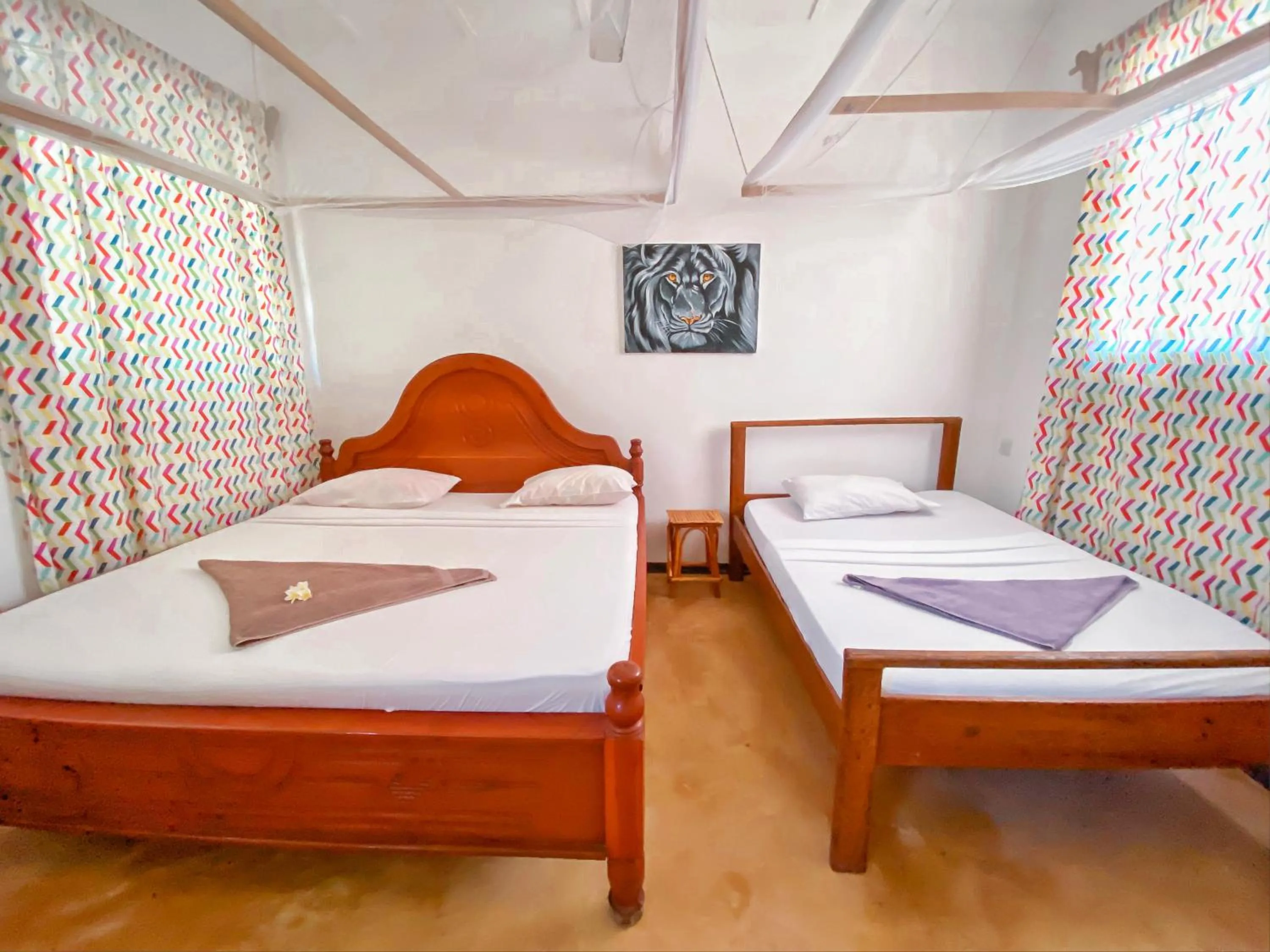 Bed in Papaya Guest House Nungwi