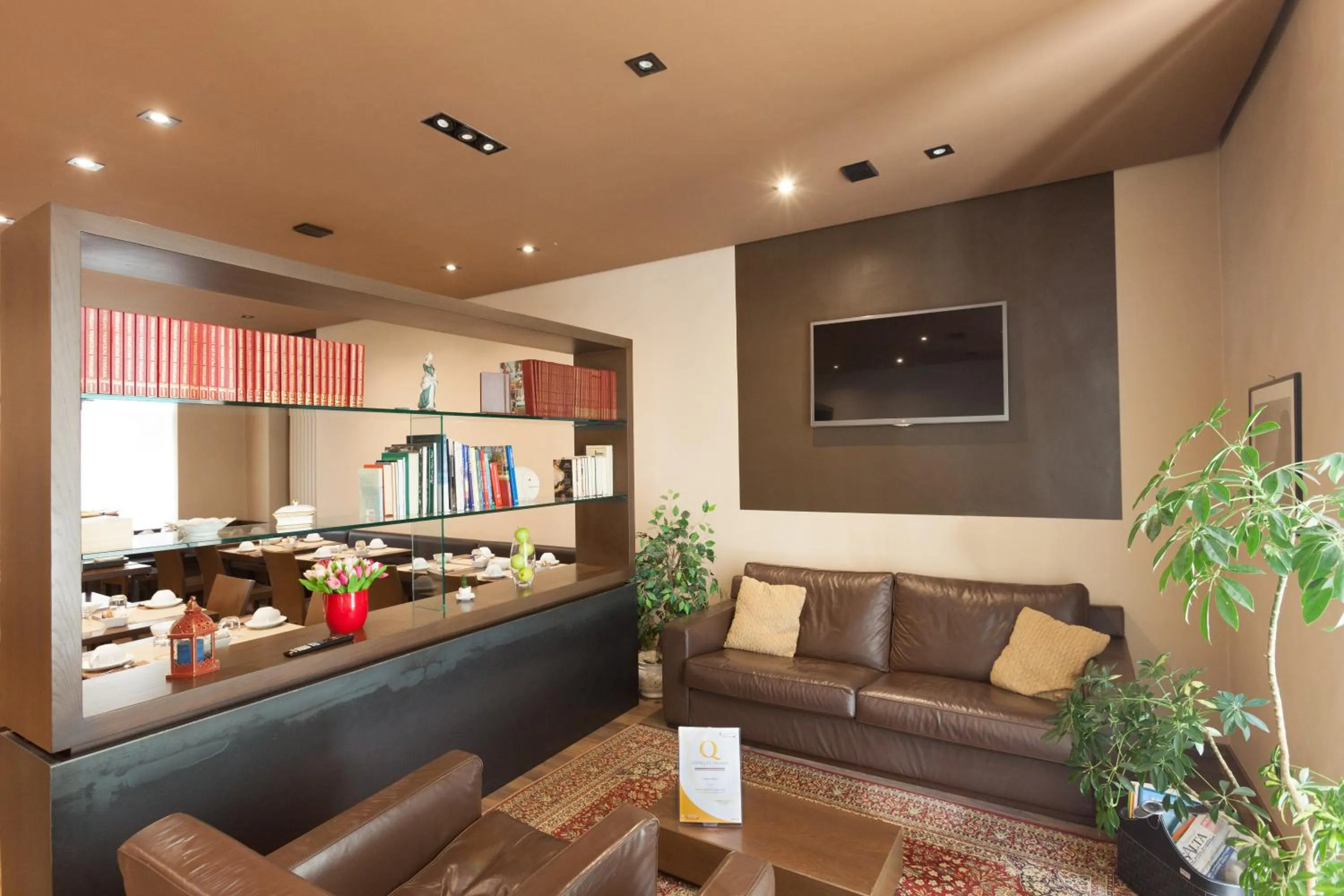 Communal lounge/ TV room in Cuneo Hotel