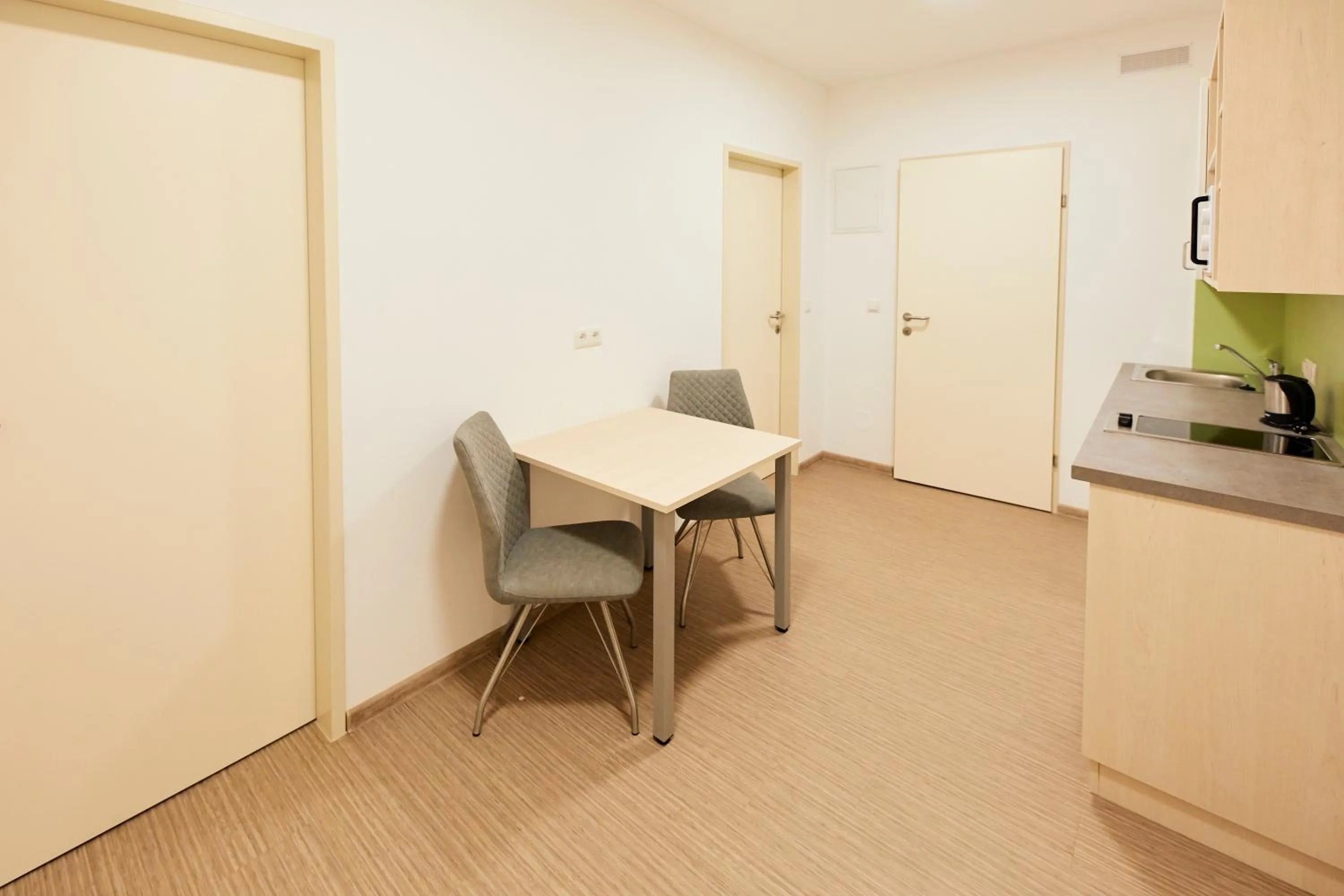 Kitchen or kitchenette in I AM HOTEL Leoben