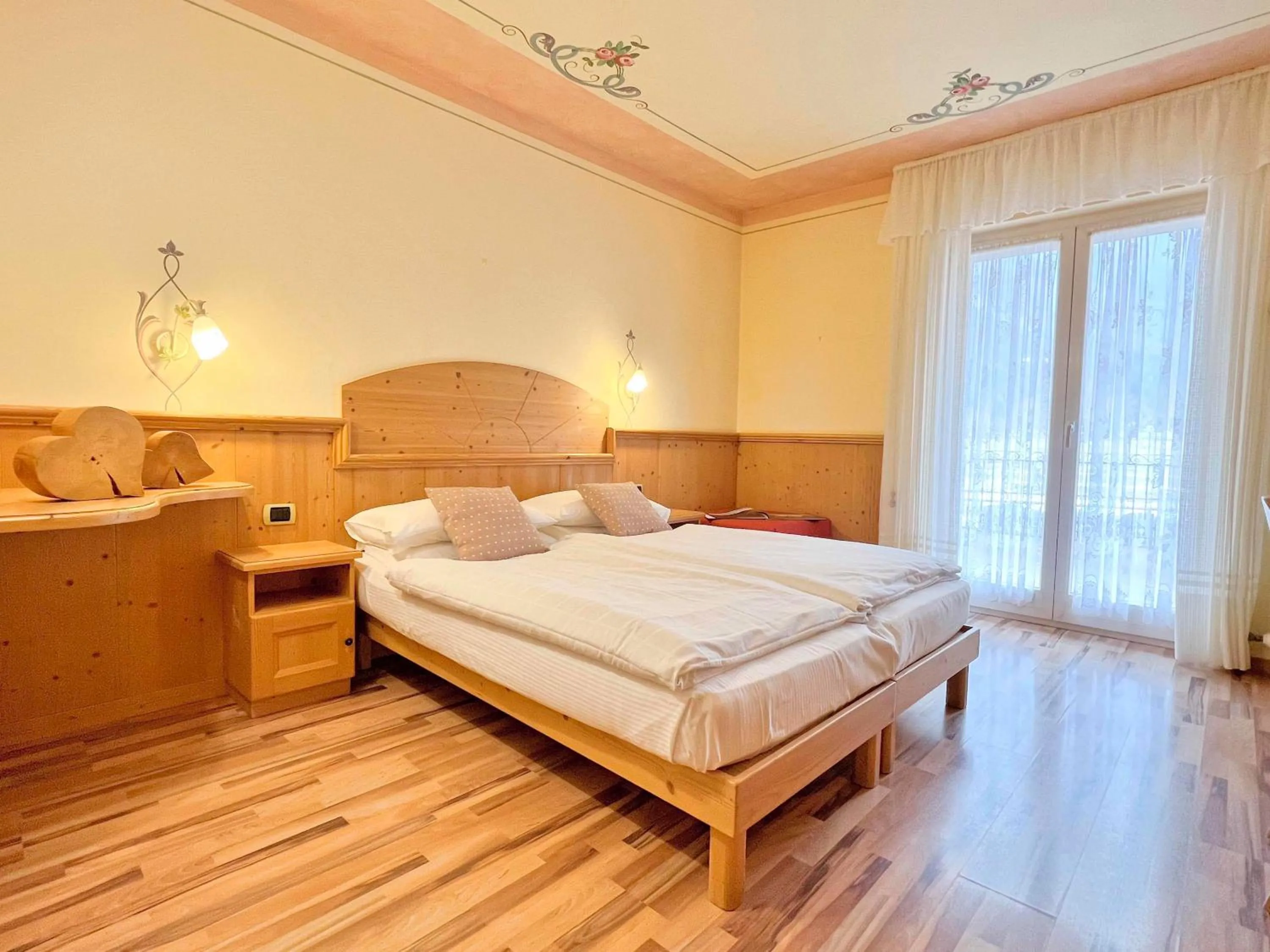 Bed in Alledolomiti Boutique Lake Hotel - Adults friendly