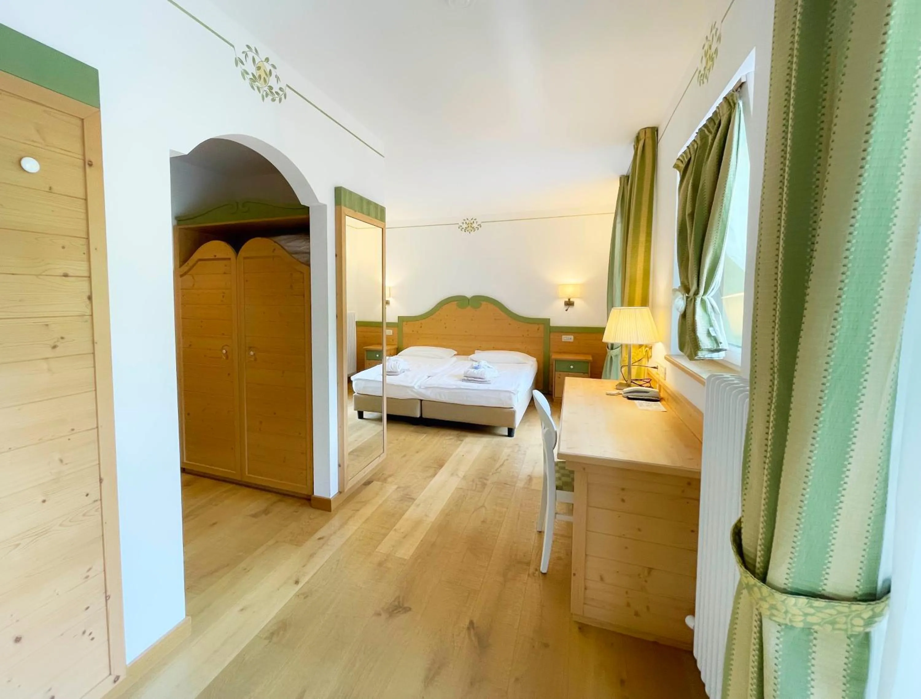 Bedroom, Bed in Alledolomiti Boutique Lake Hotel - Adults friendly