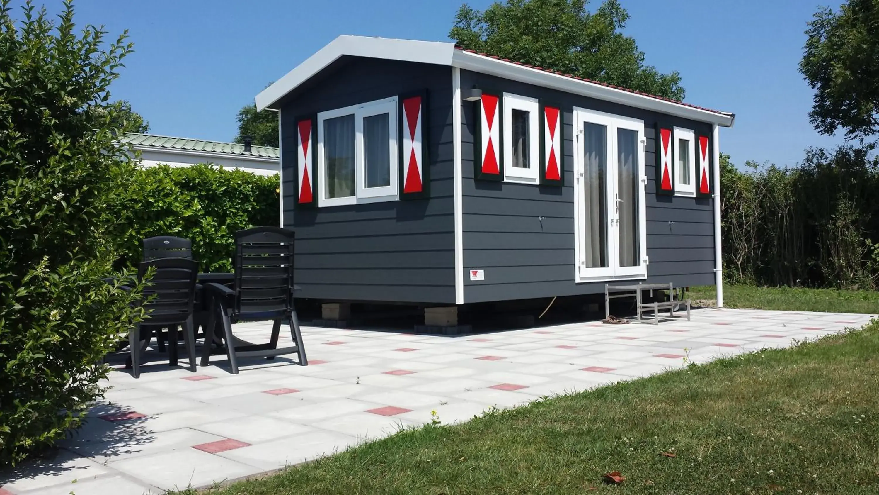 Tinyhouse de tuinfluiter Tinyhouse de tuinfluiter