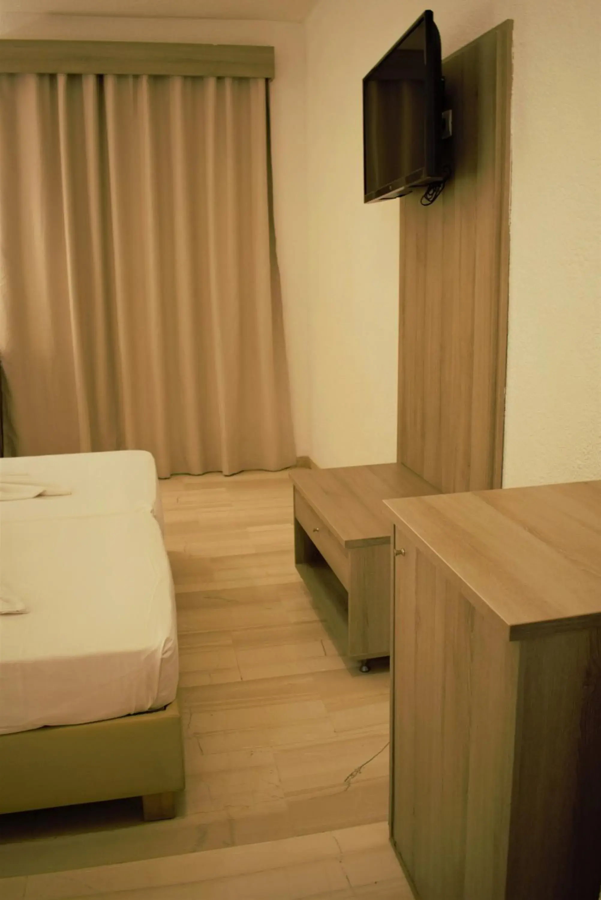 TV and multimedia, Bed in Apollon Hotel TV and multimedia, Bed in Apollon Hotel