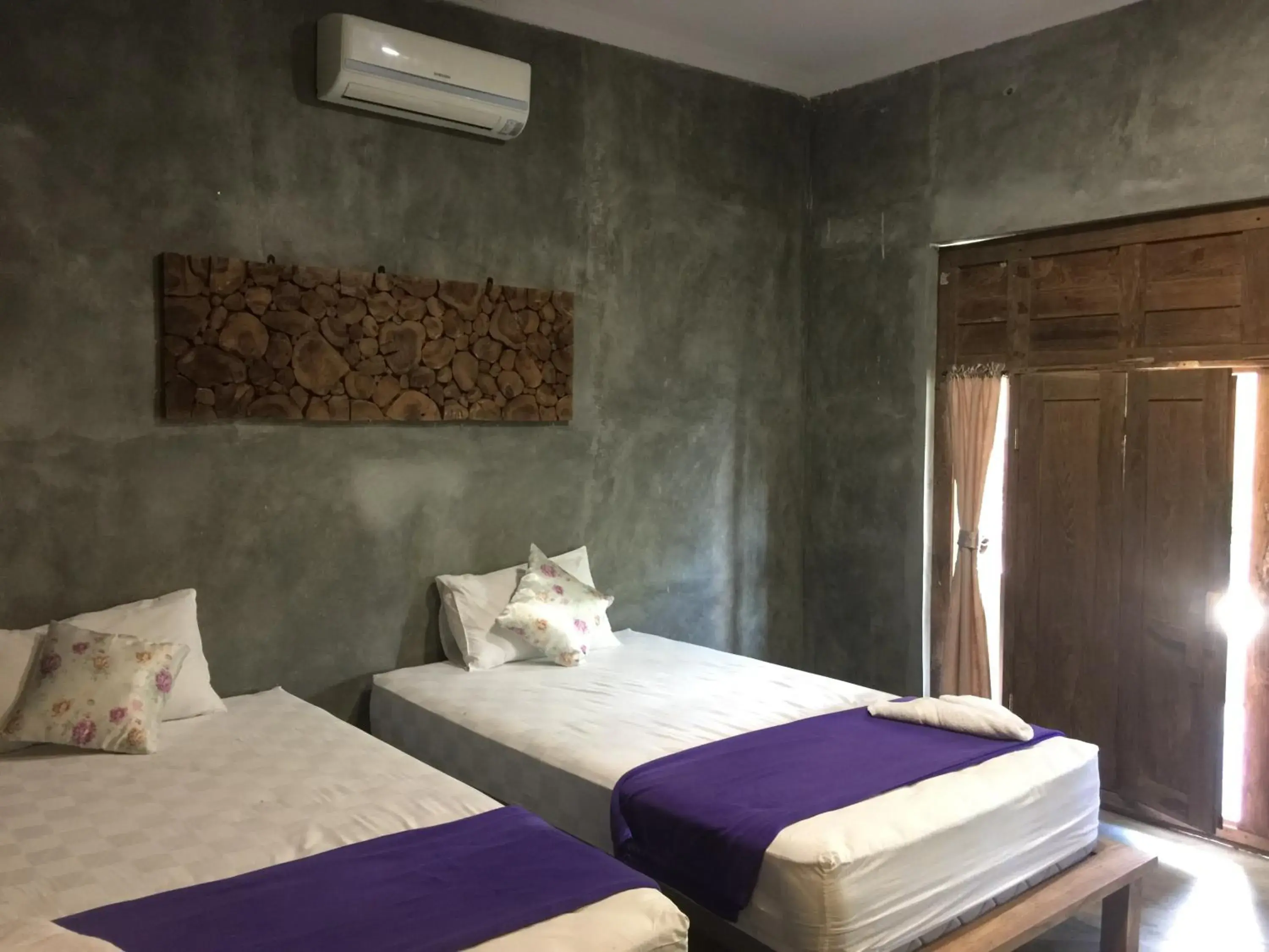 Triple Room in Watukarung Ristu Homestay Triple Room in Watukarung Ristu Homestay