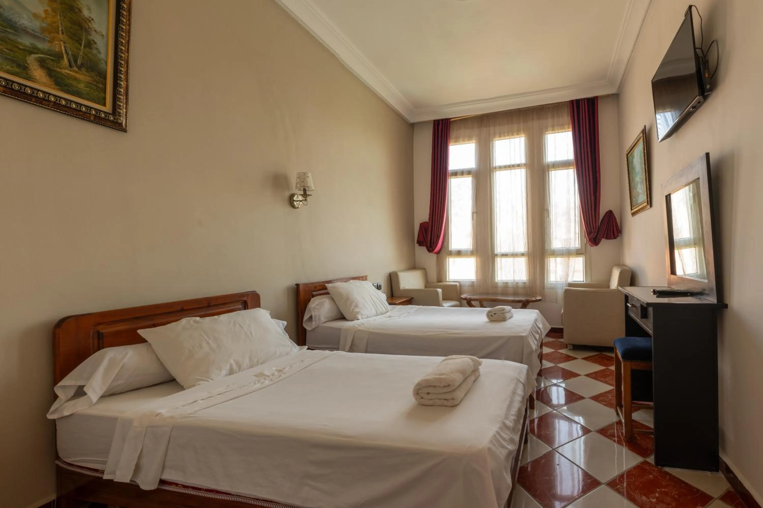 Bed in Hotel Saint Antoine