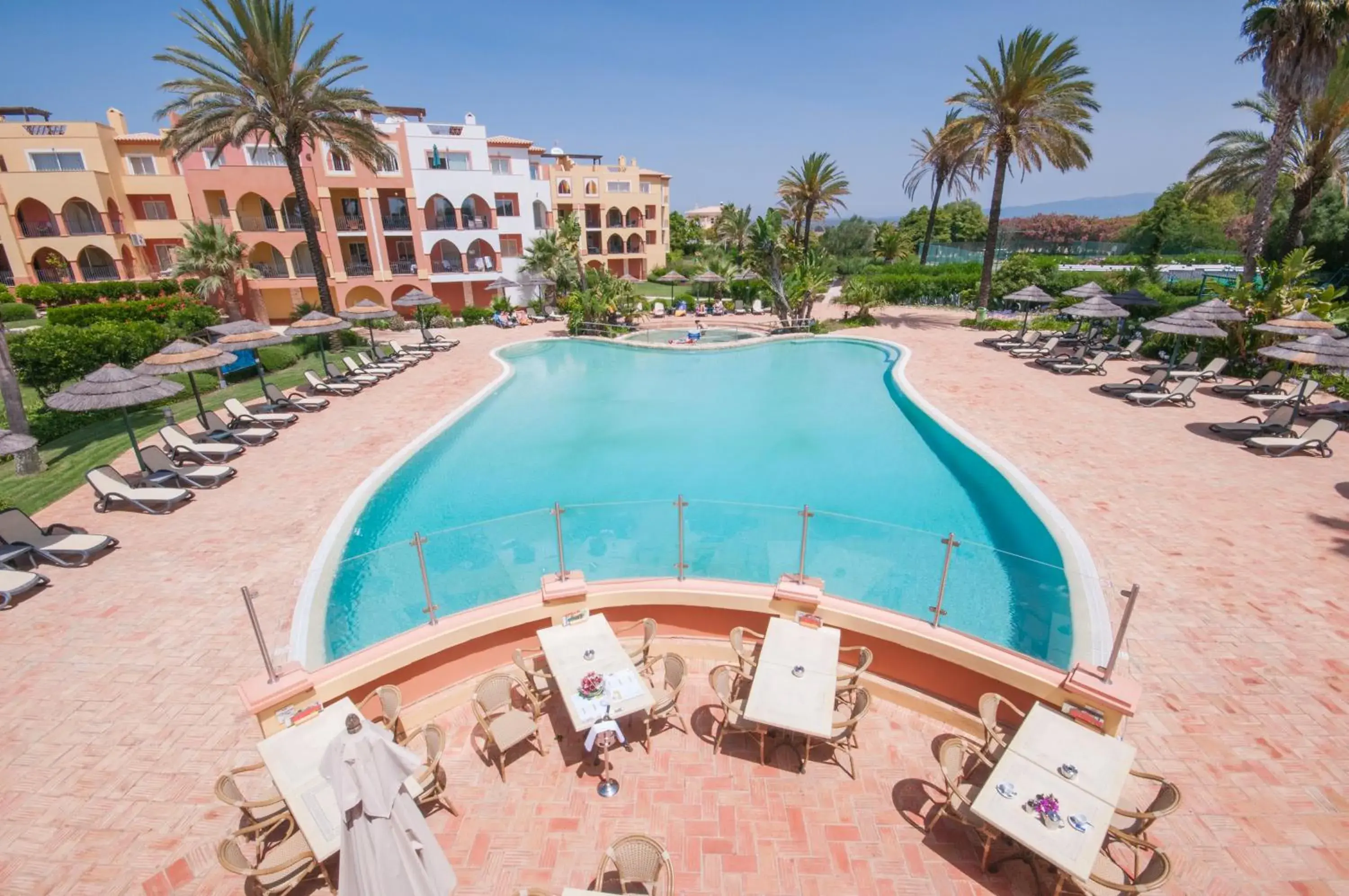 Swimming pool in Jardim da Meia Praia Resort Swimming pool in Jardim da Meia Praia Resort