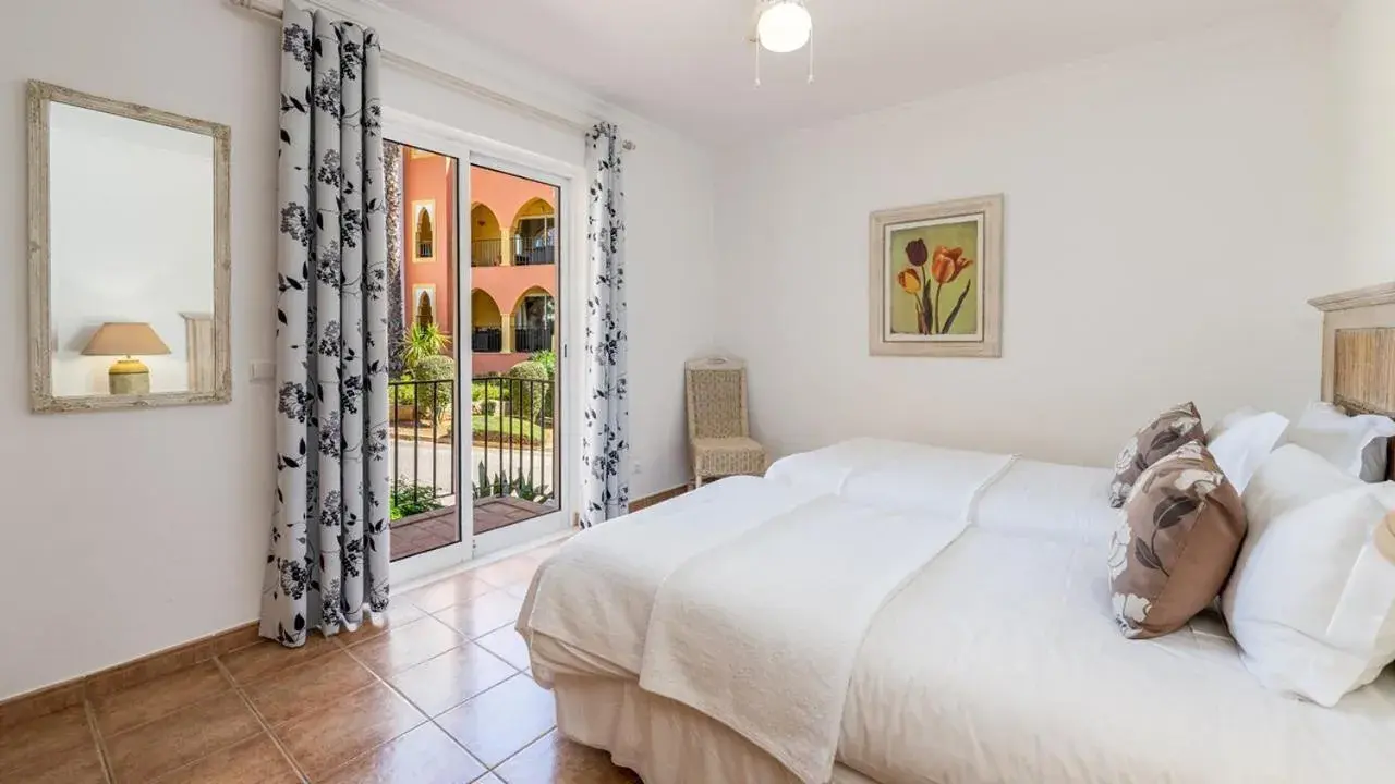 Bed in Jardim da Meia Praia Resort Bed in Jardim da Meia Praia Resort