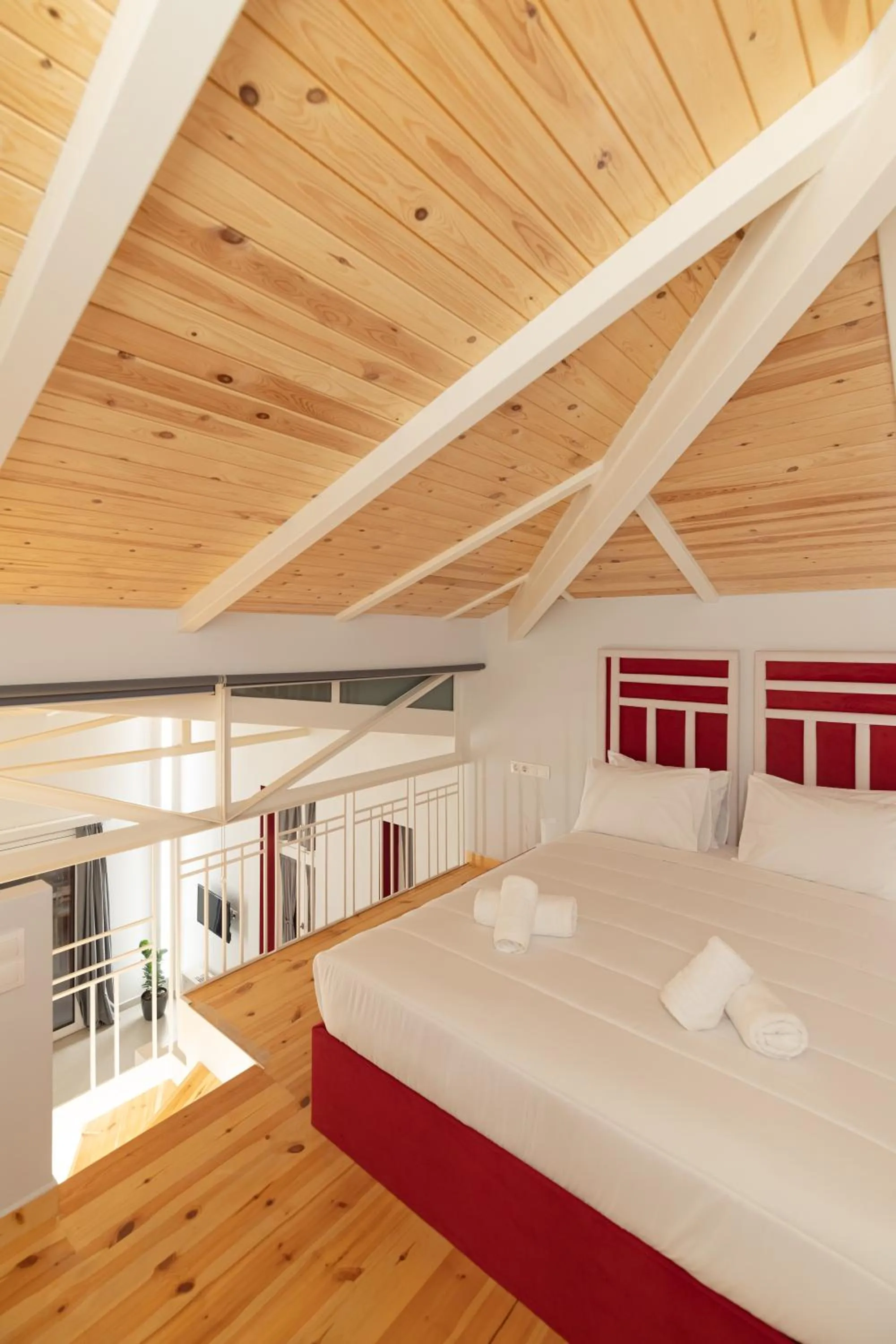 Bed in Ether Loft Suites