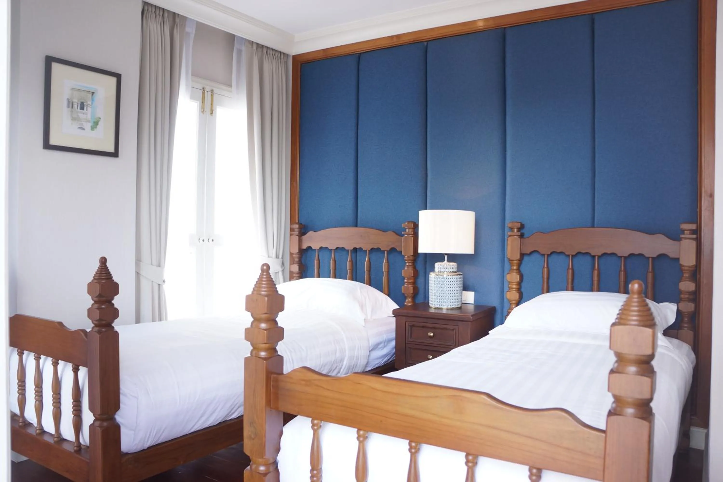 Bed in Hiranyakul House Riverside