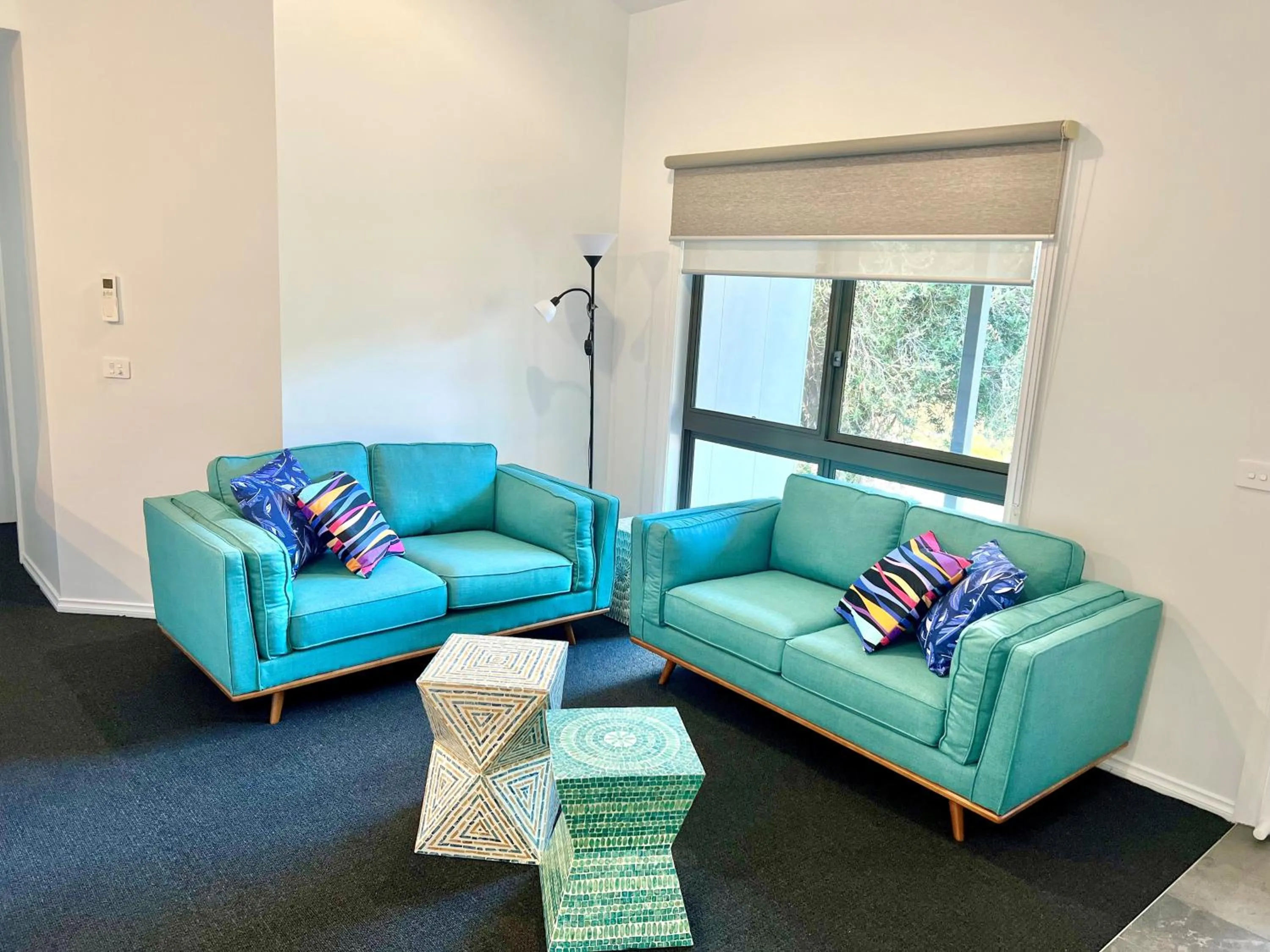 Living room in Mountain View Motor Inn & Holiday Lodges