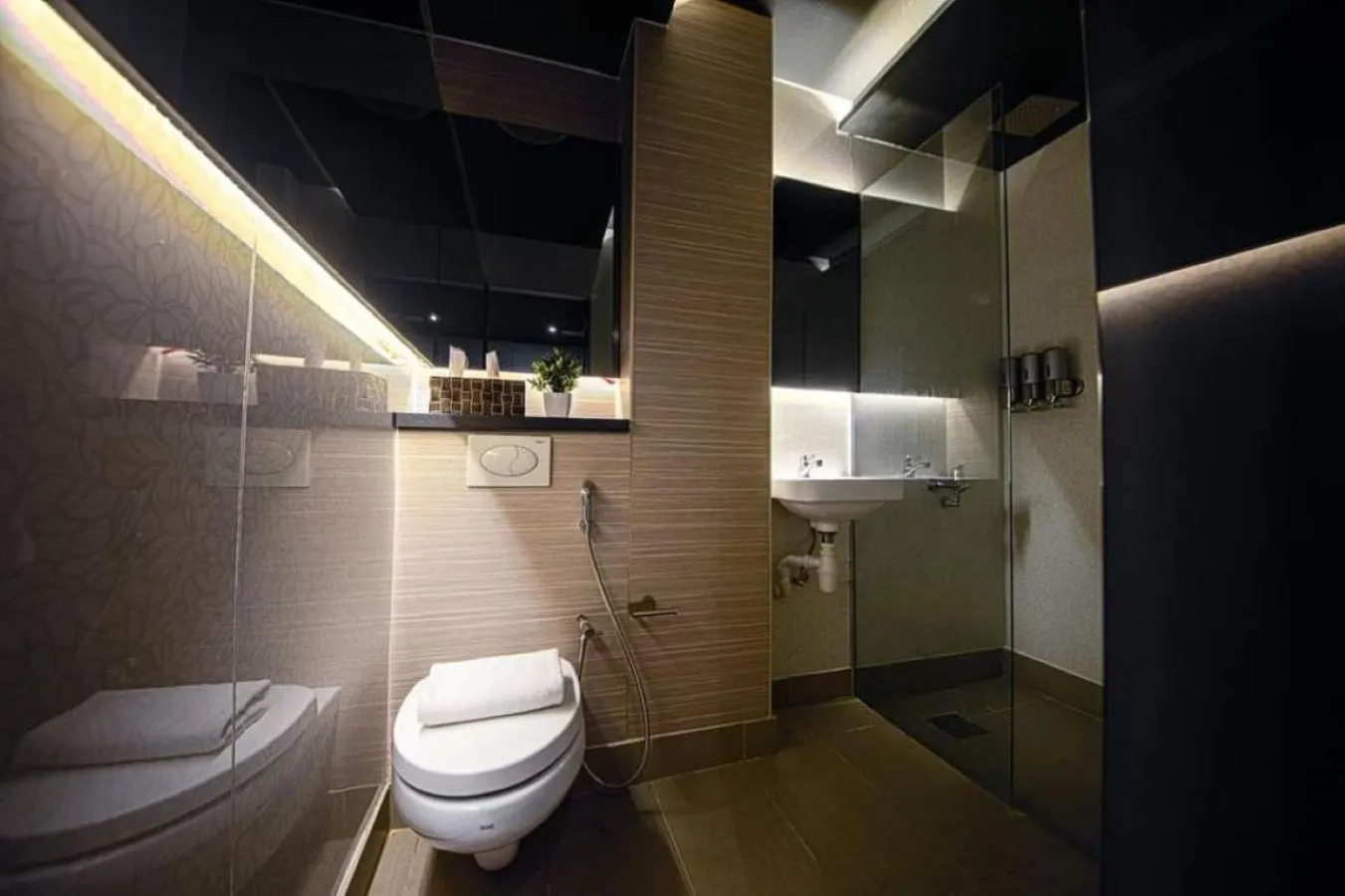 Bathroom in CUBE Family Boutique Capsule Hotel at Chinatown