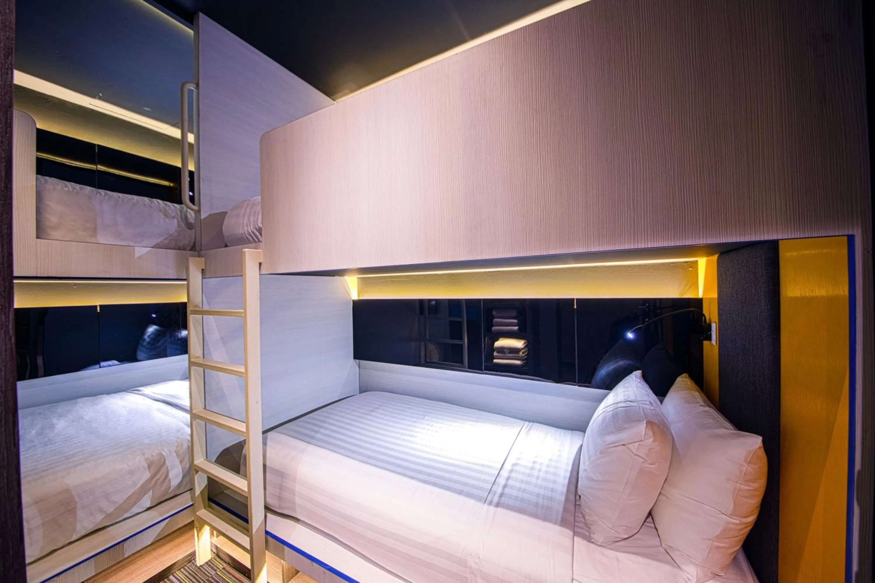 bunk bed, Bed in CUBE Family Boutique Capsule Hotel at Chinatown