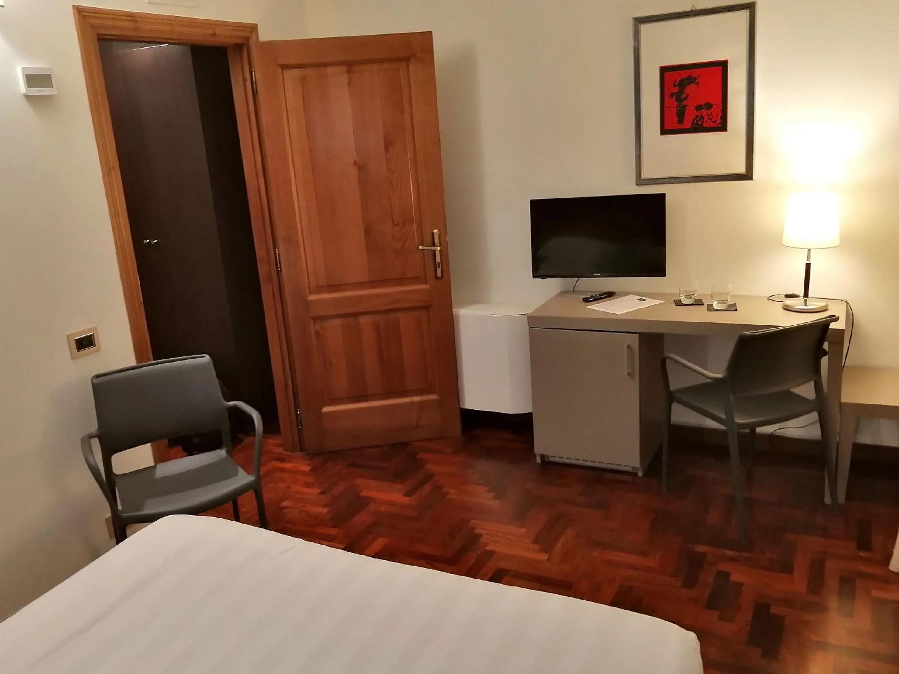 Photo of the whole room, Bed in Locanda Giustini