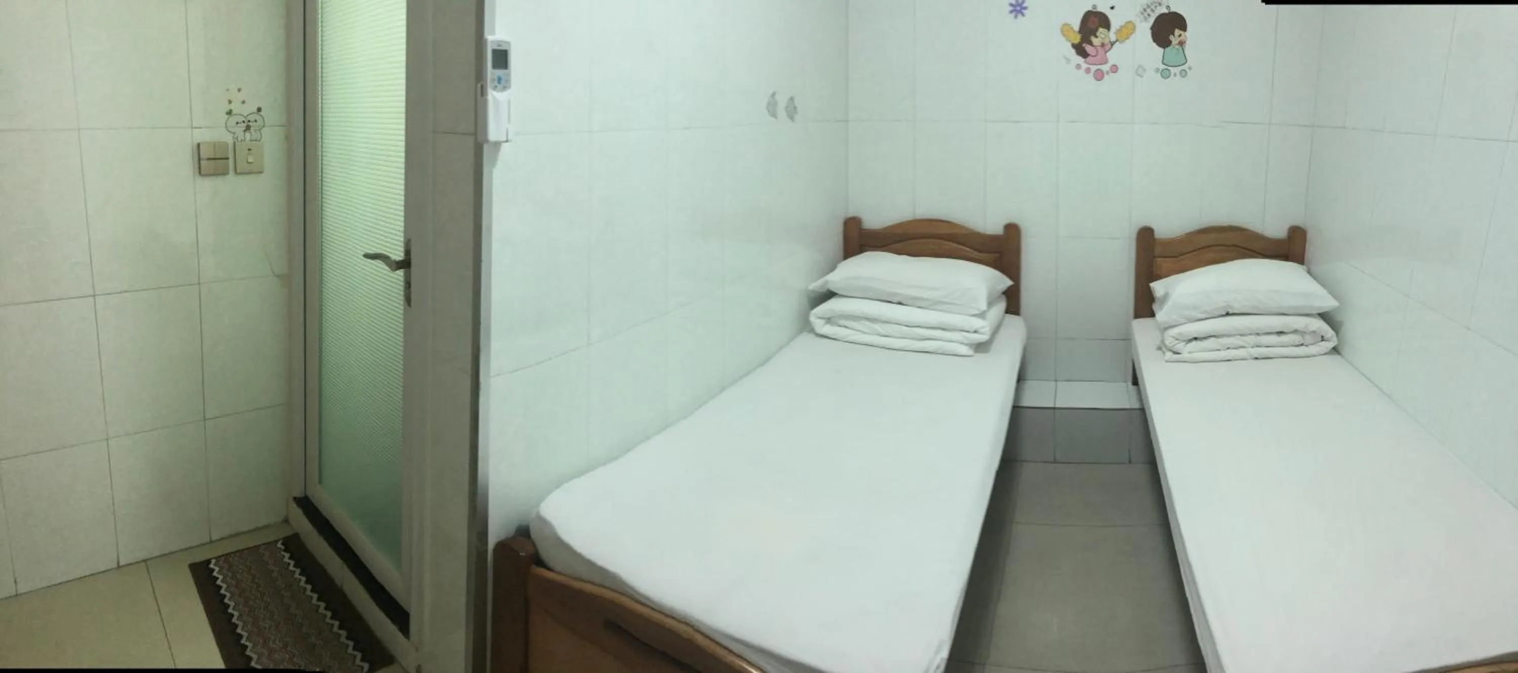 Bed in Hung Fai Guest House