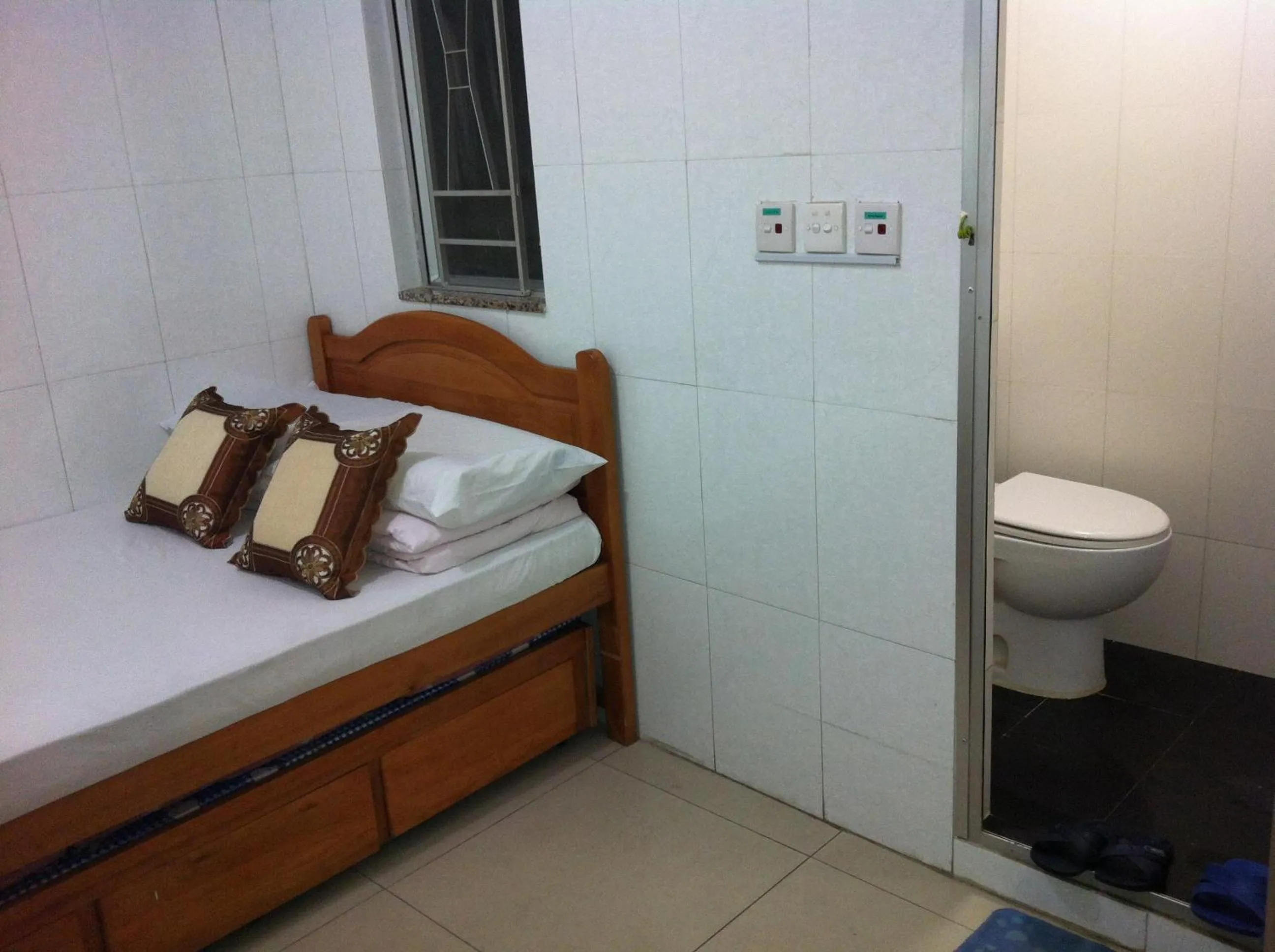 Decorative detail, Bed in Hung Fai Guest House