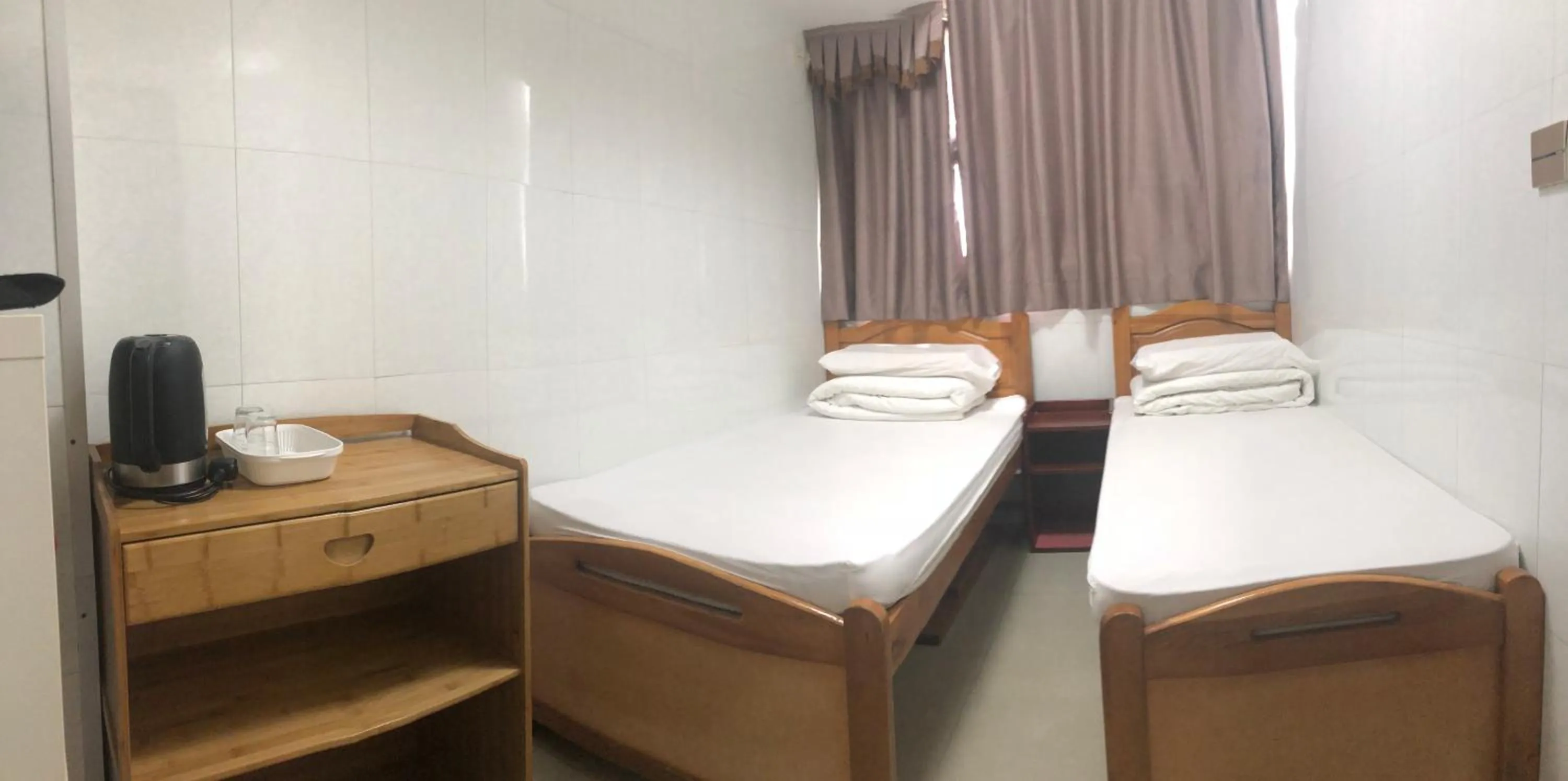 Bed in Hung Fai Guest House