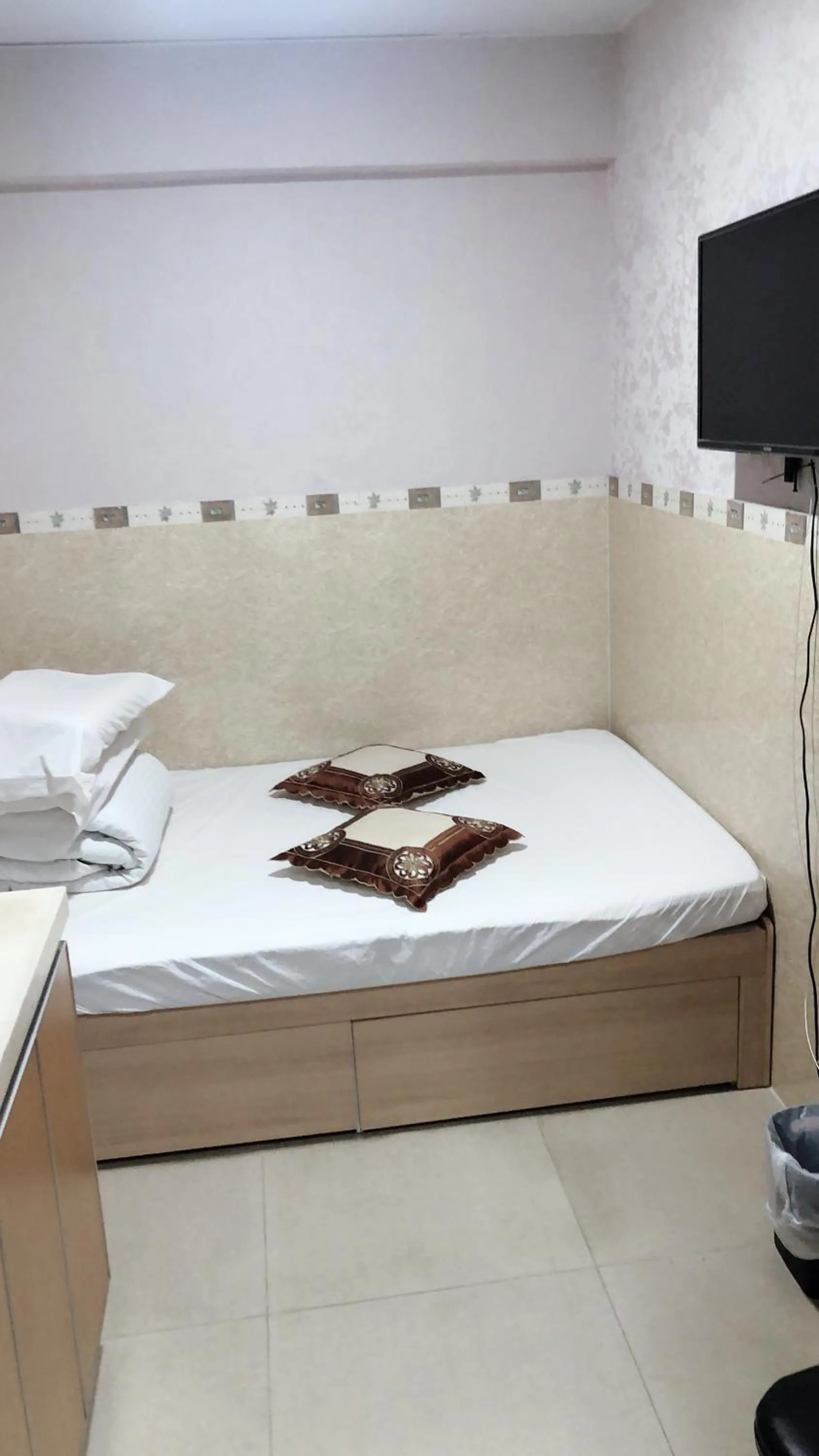 Bed in Hung Fai Guest House