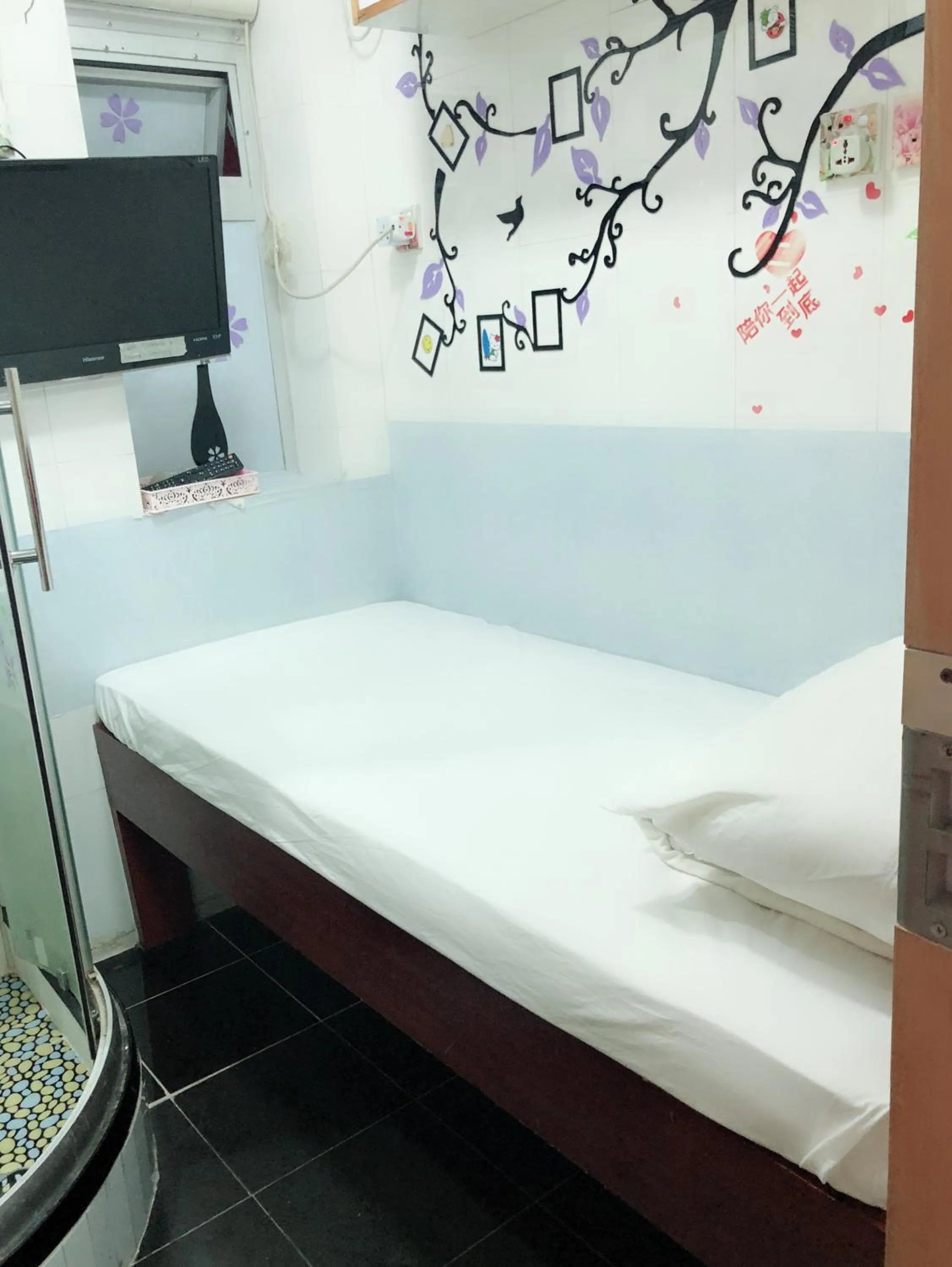 Bed in Hung Fai Guest House