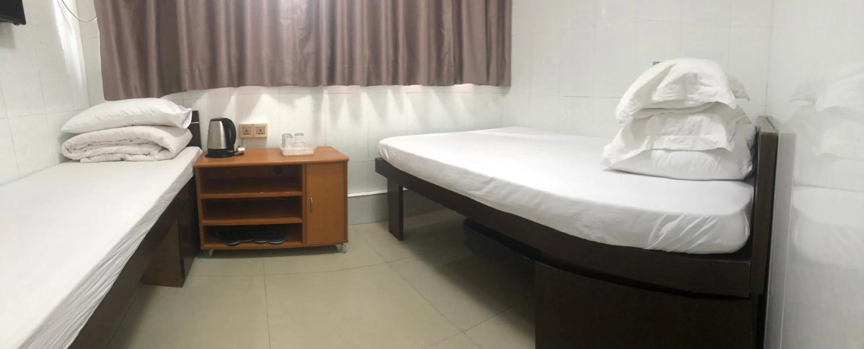 Bed in Hung Fai Guest House