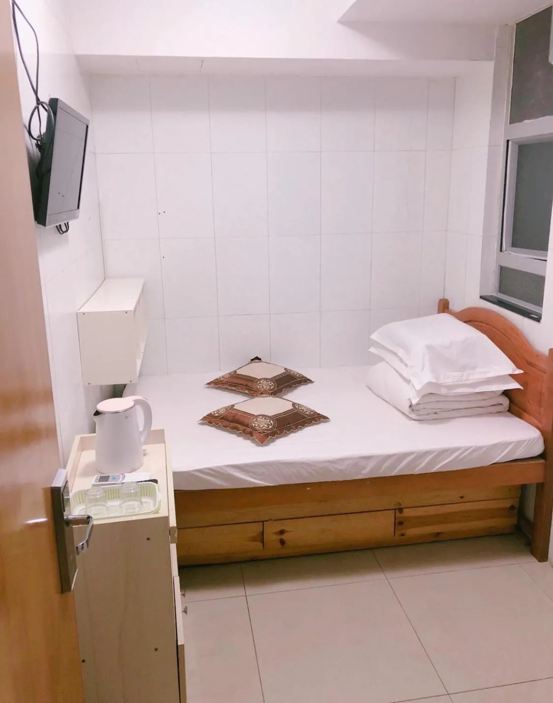 Bed in Hung Fai Guest House