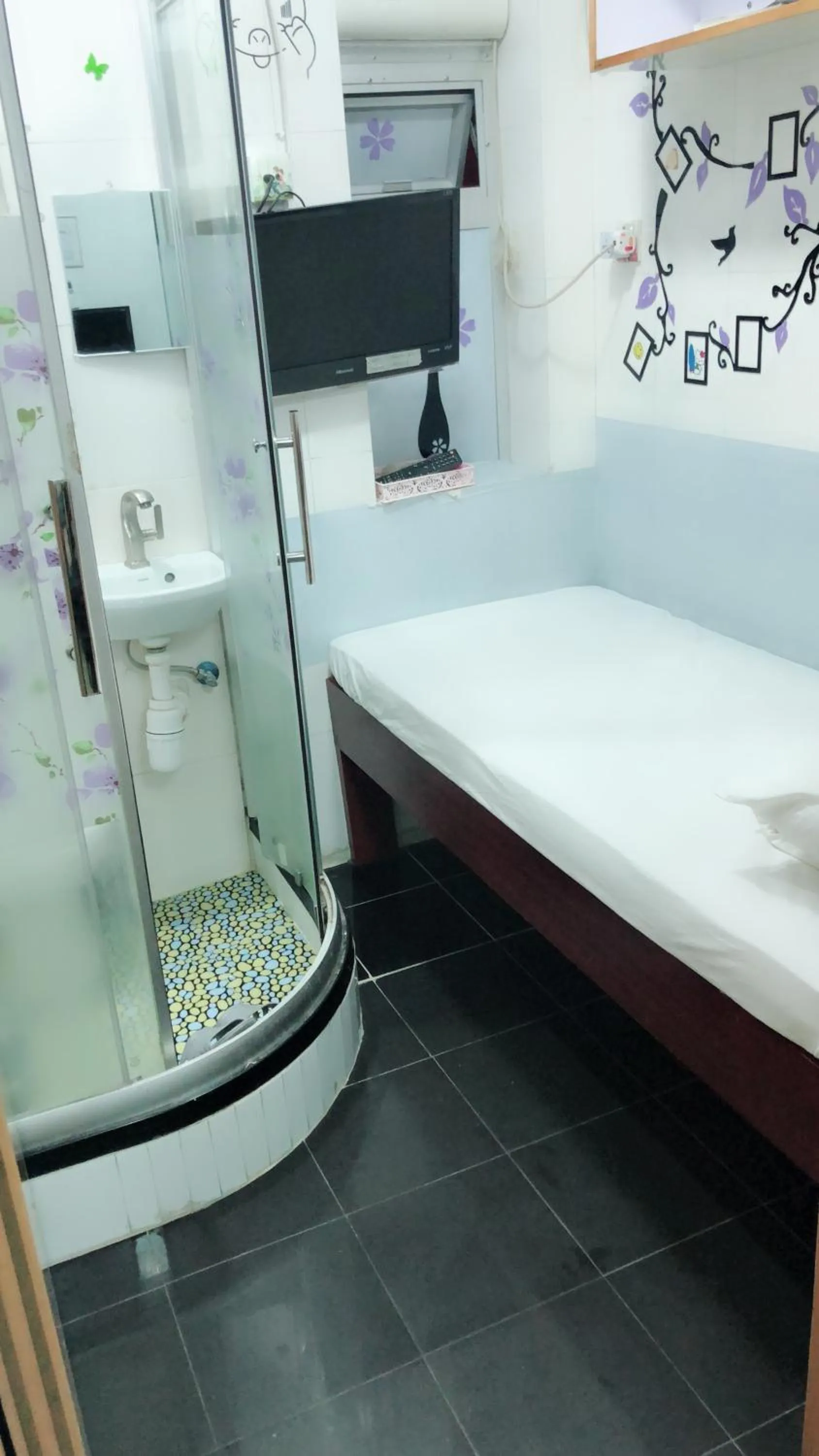 Bed in Hung Fai Guest House