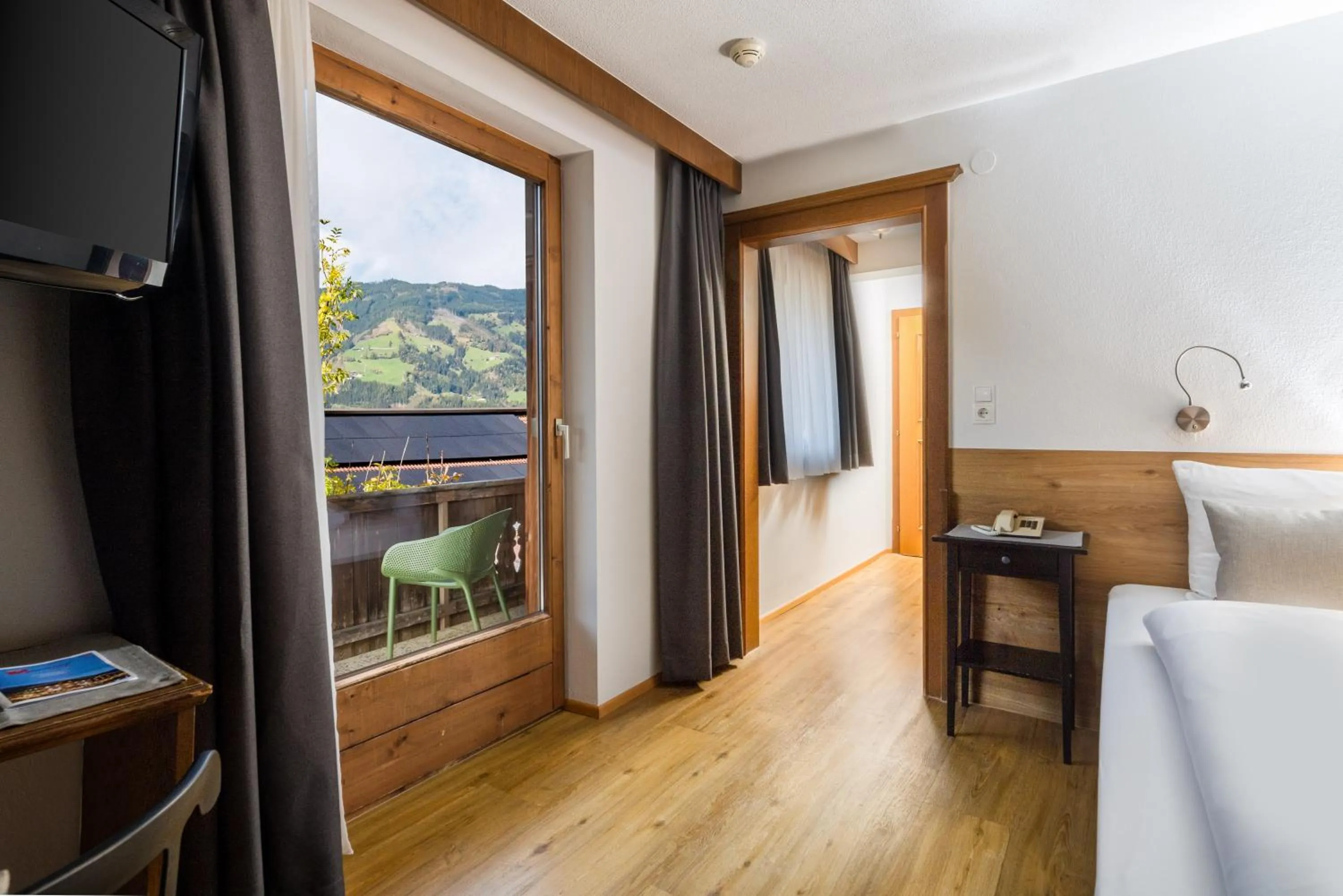 Photo of the whole room, Bed in Hotel Standlhof Zillertal