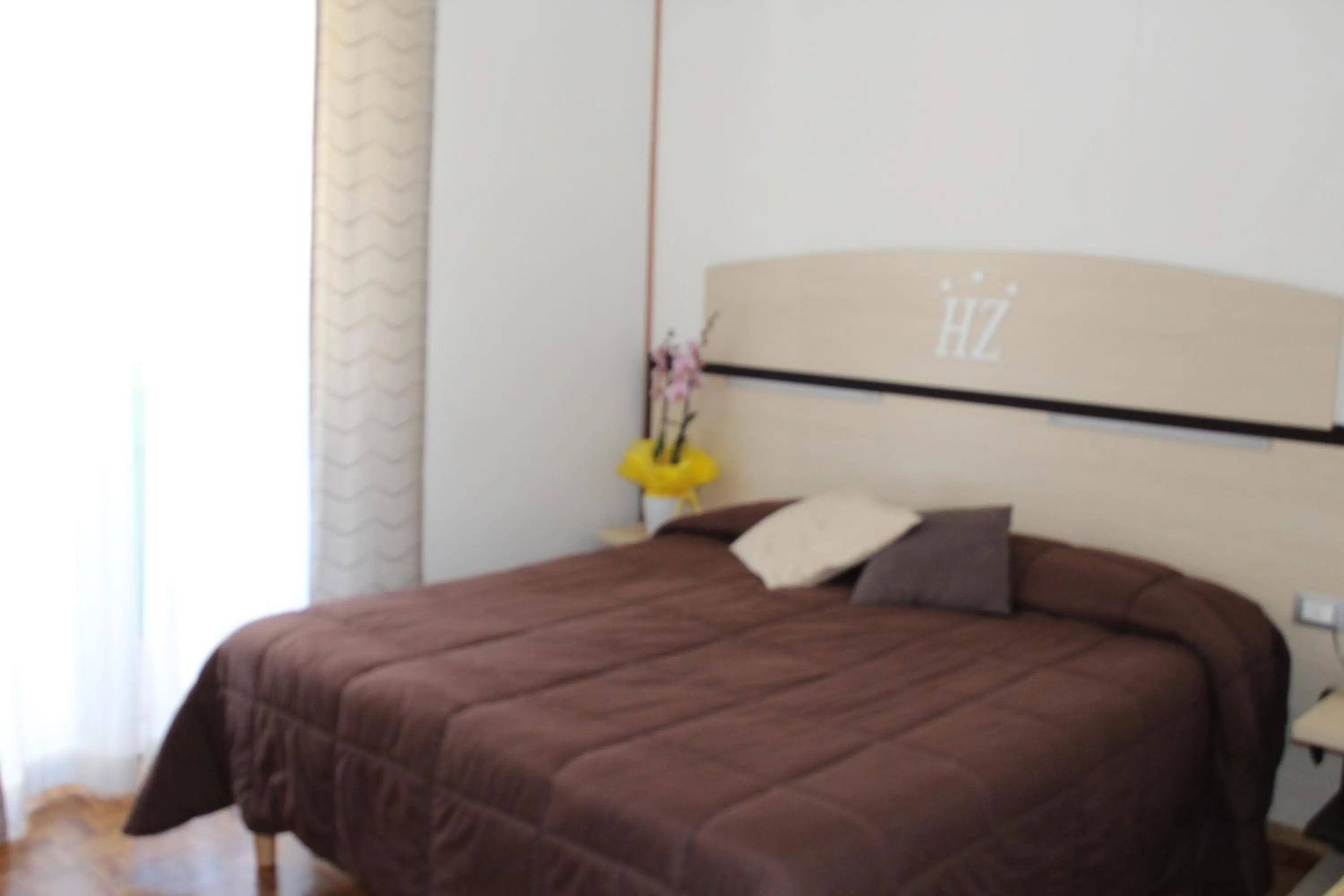 Bed in Hotel Allo Zodiaco