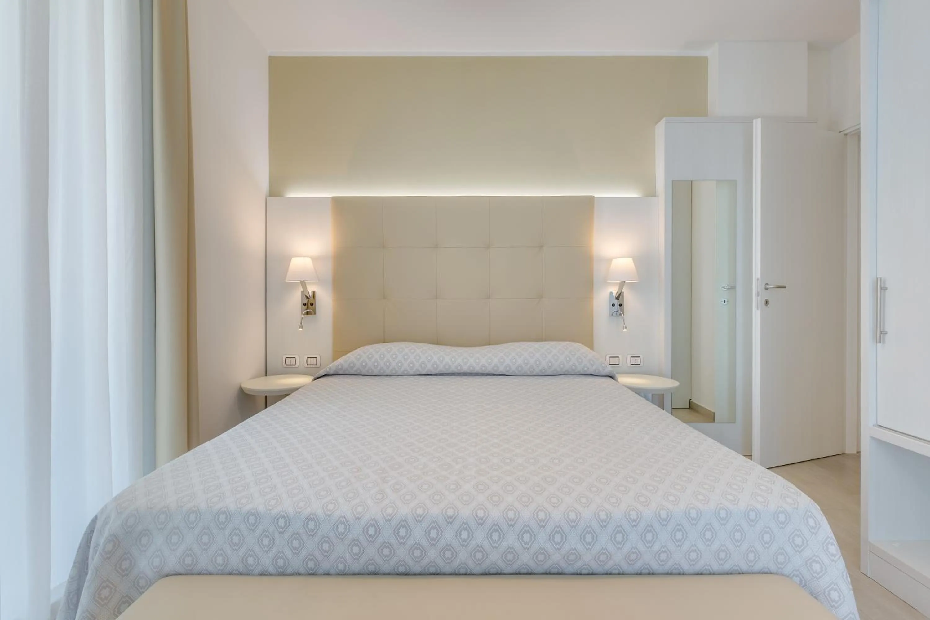 Bed in Hotel Ambassador