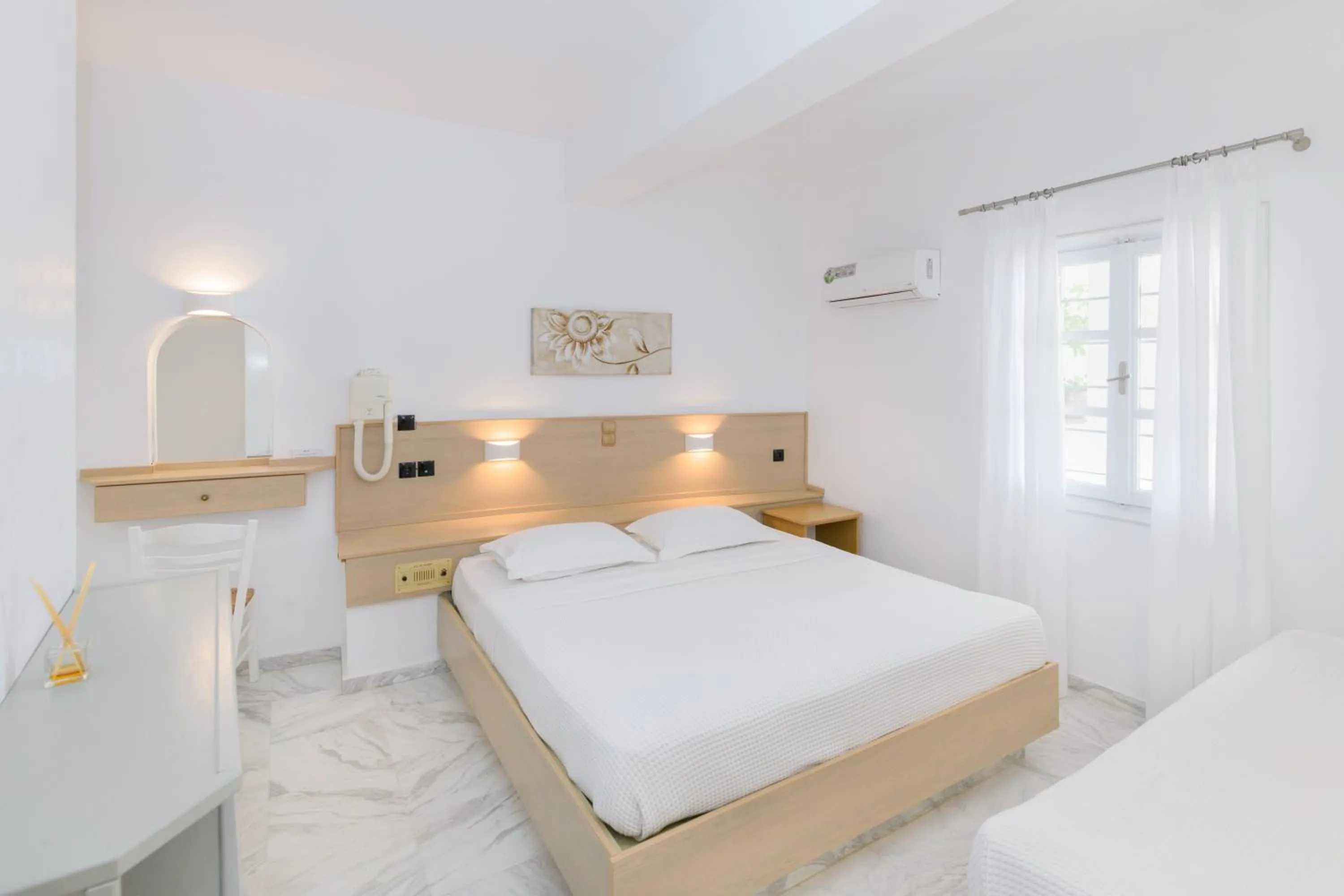 Bedroom in Sunset View Hotel