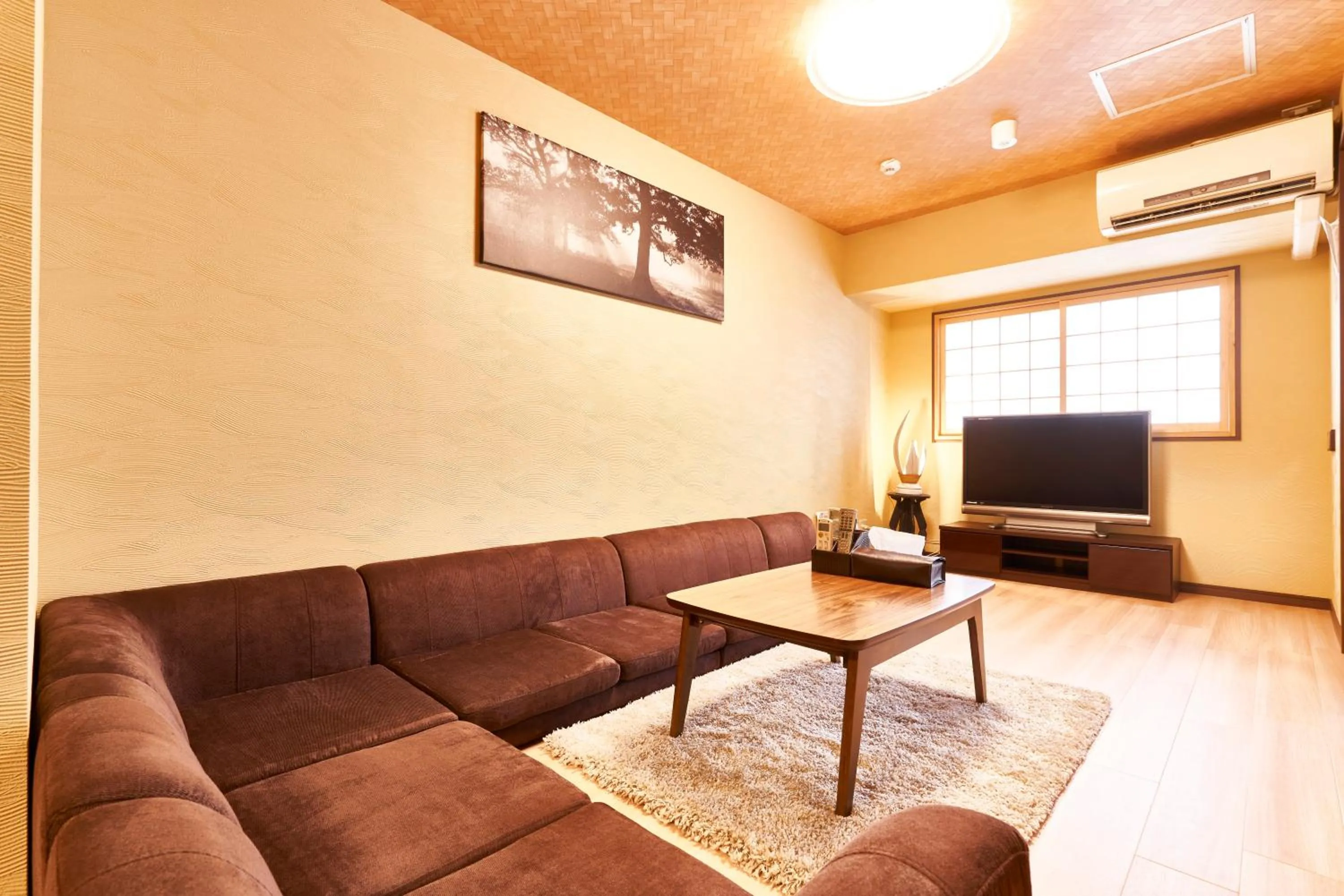 Living room in Miyazakiya Plus