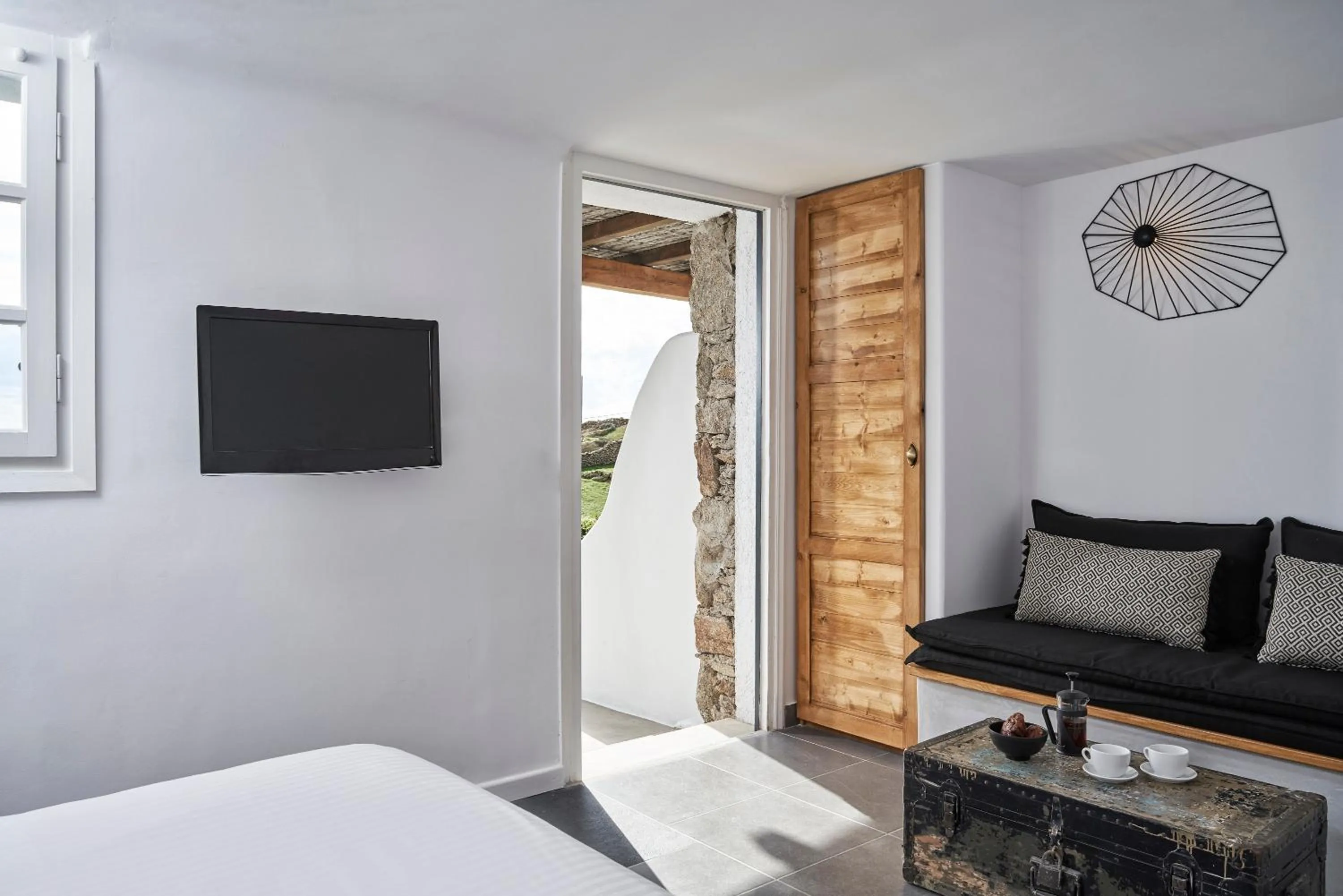 Seating area, Bed in Almyra Guest Houses