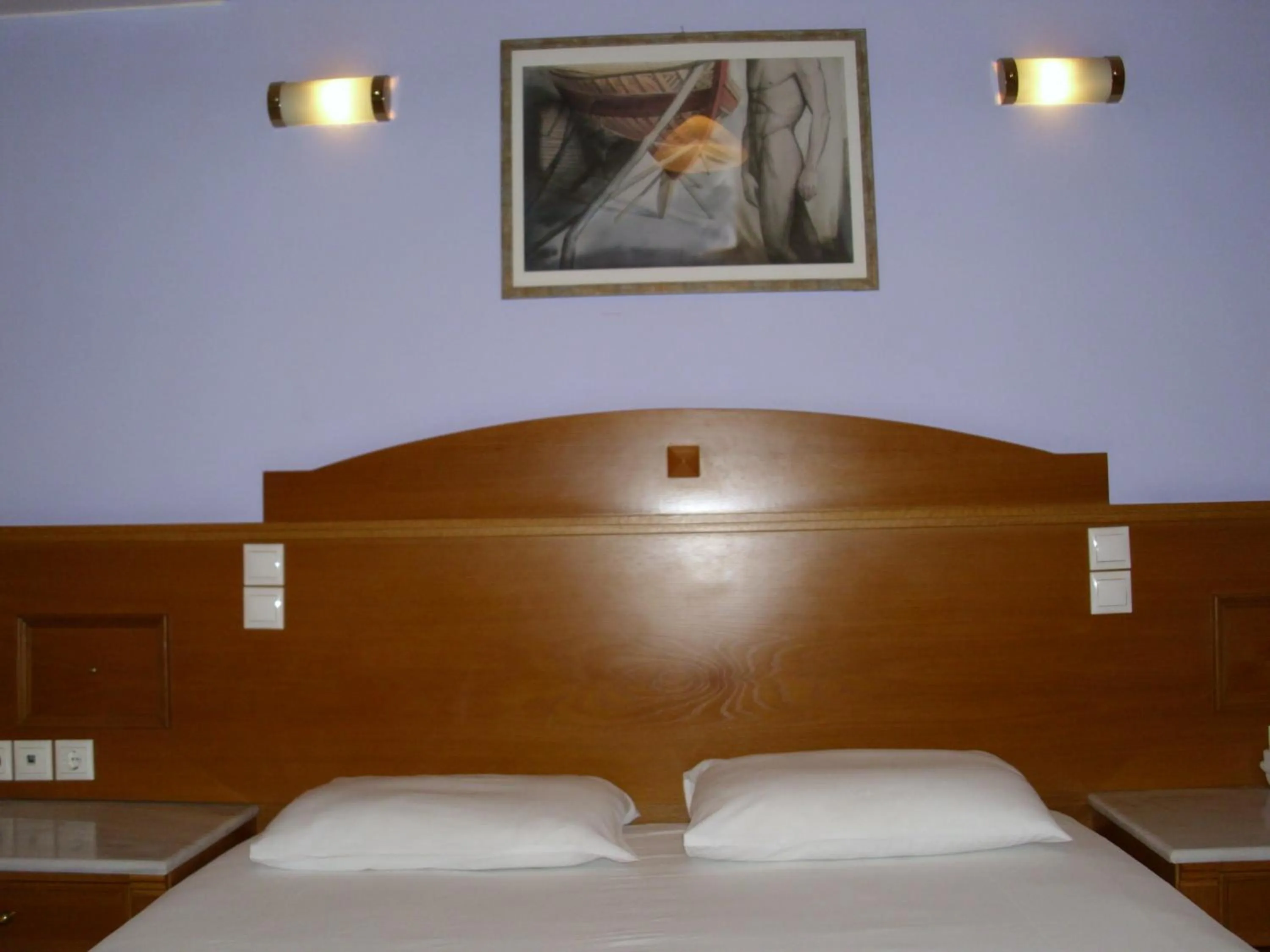 Bed in Hotel Cybele Pefki