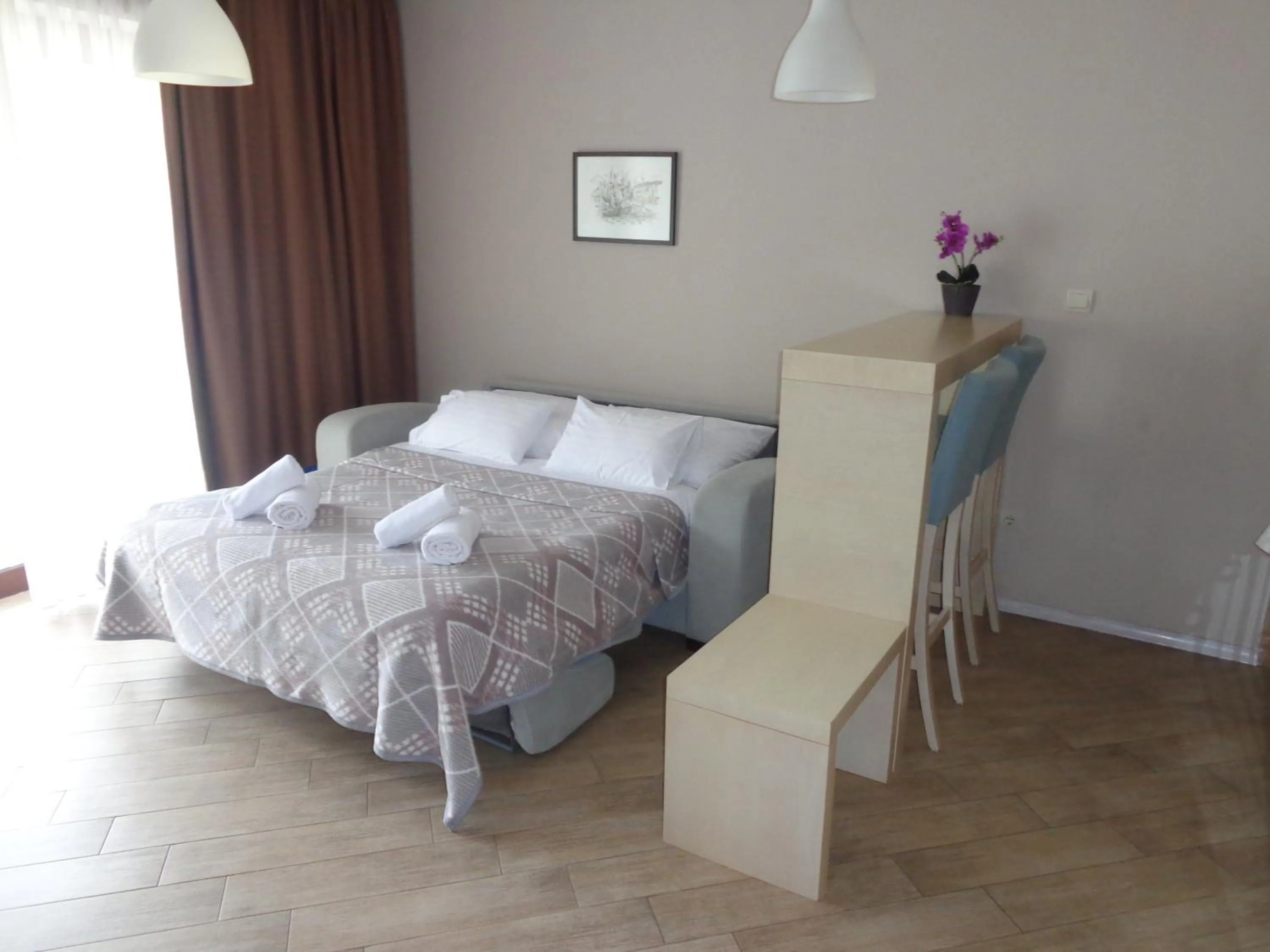 Living room, Bed in Apartments Bella di Mare