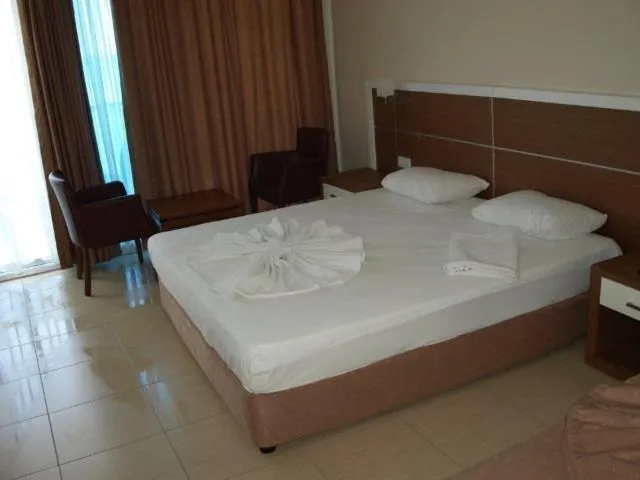 Bed in Venessa Beach Hotel