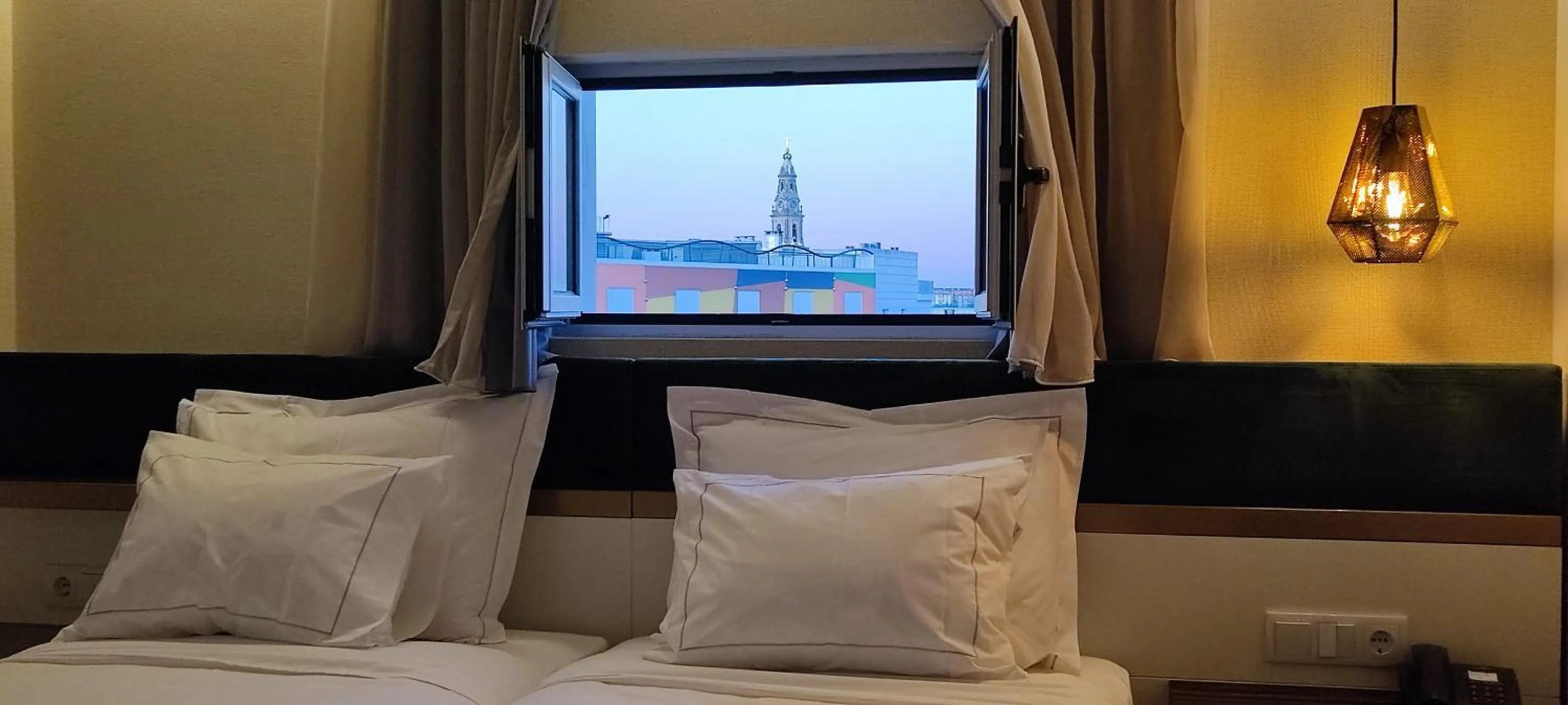 Bed in Hotel 4 Estações