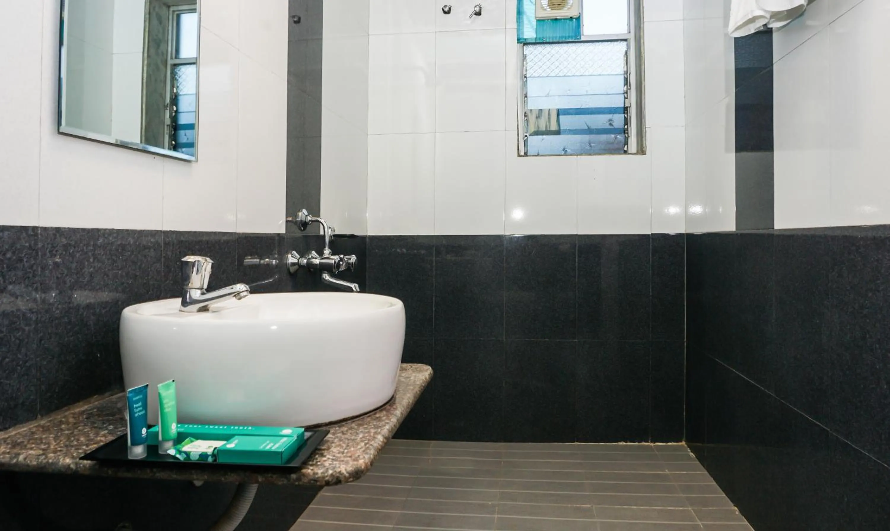 Bathroom in Treebo Hillway Inn Main Market