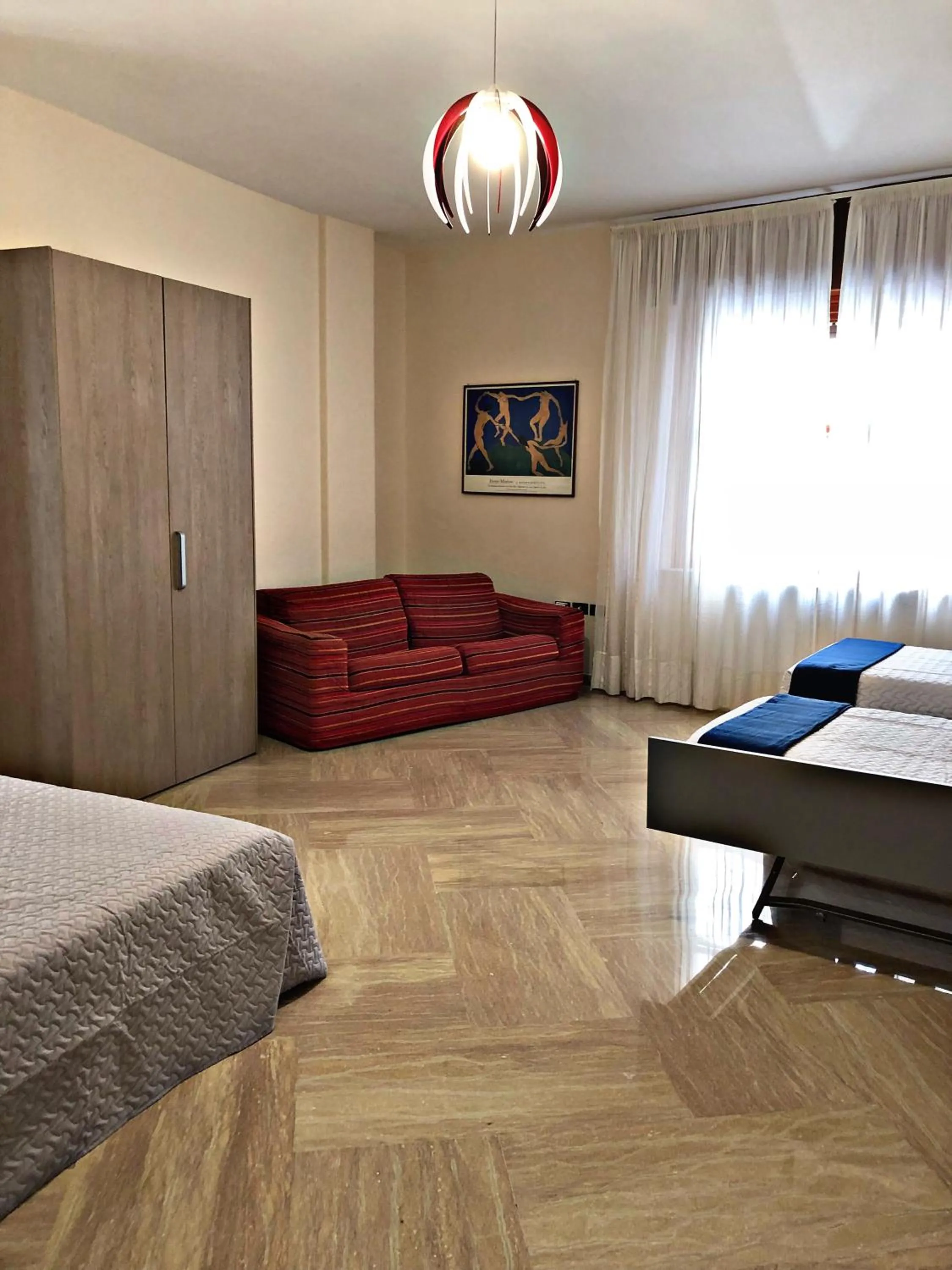 Bed in Napoli City Inn