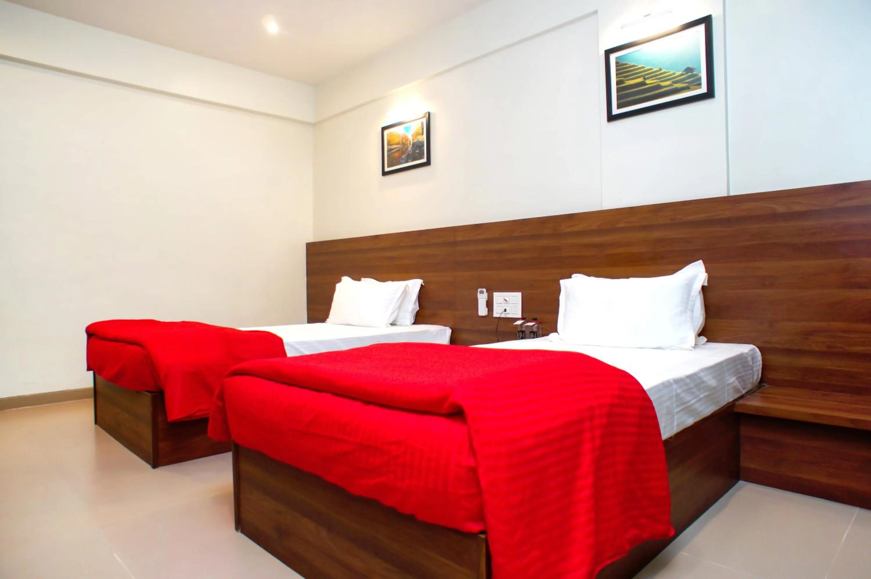 Bedroom, Bed in Mastiff Hotel Chinchwad by OTHPL